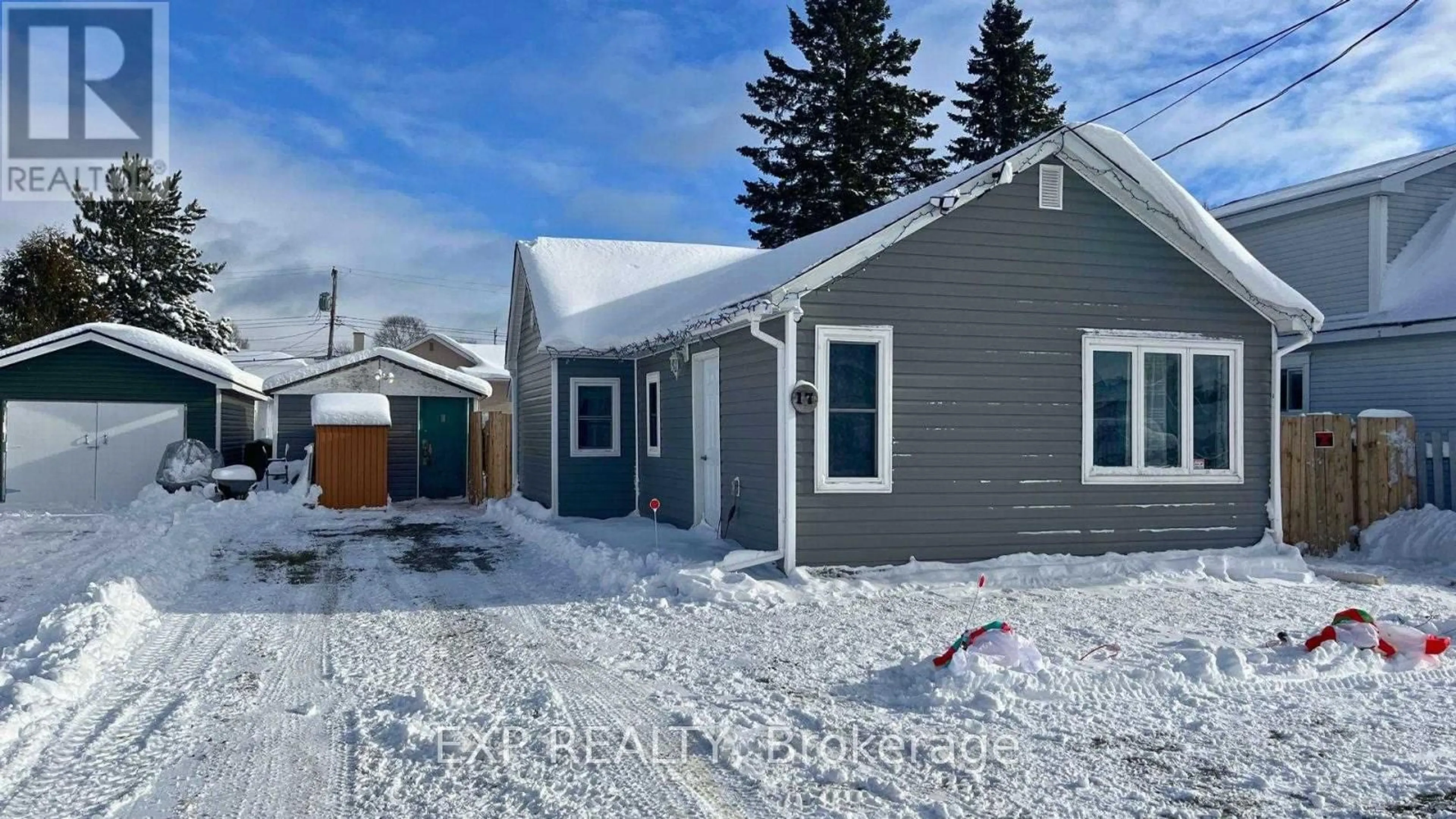 Home with vinyl exterior material, street for 17 Third Ave, Wawa Ontario P0S 1K0