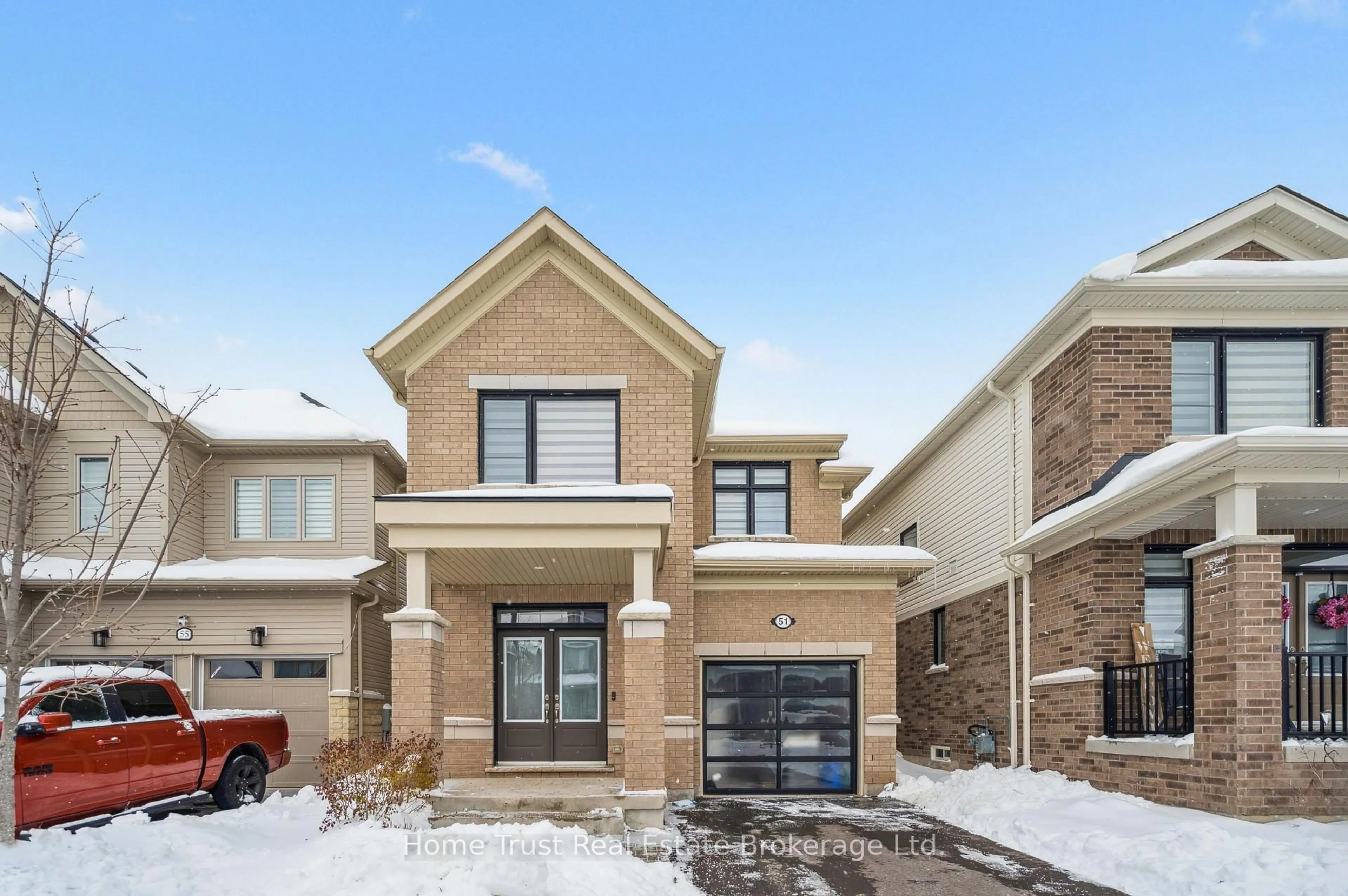 Home with brick exterior material, street for 51 Harpin Way, Centre Wellington Ontario N1M 2W3
