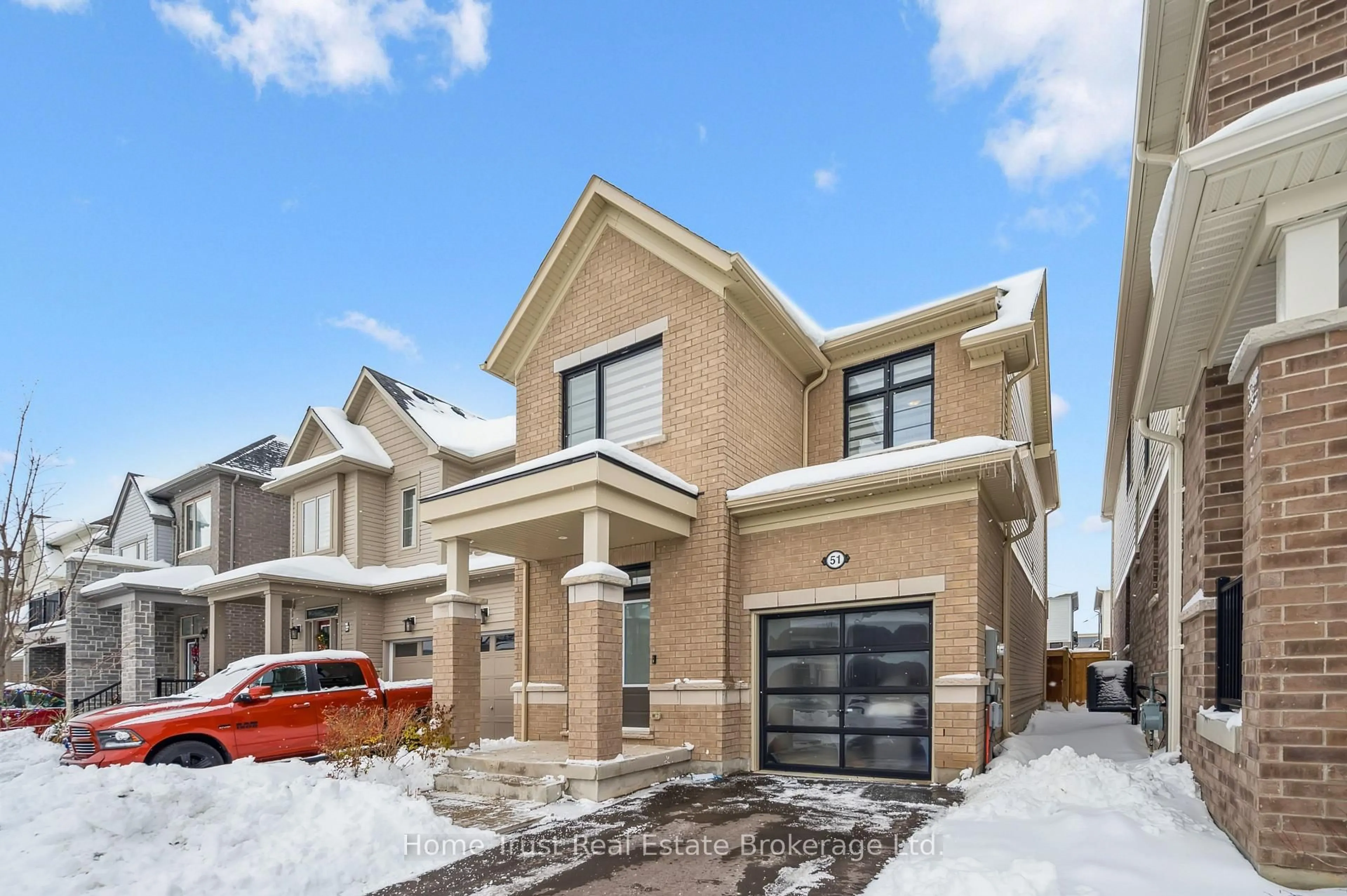 Home with brick exterior material, street for 51 Harpin Way, Centre Wellington Ontario N1M 2W3