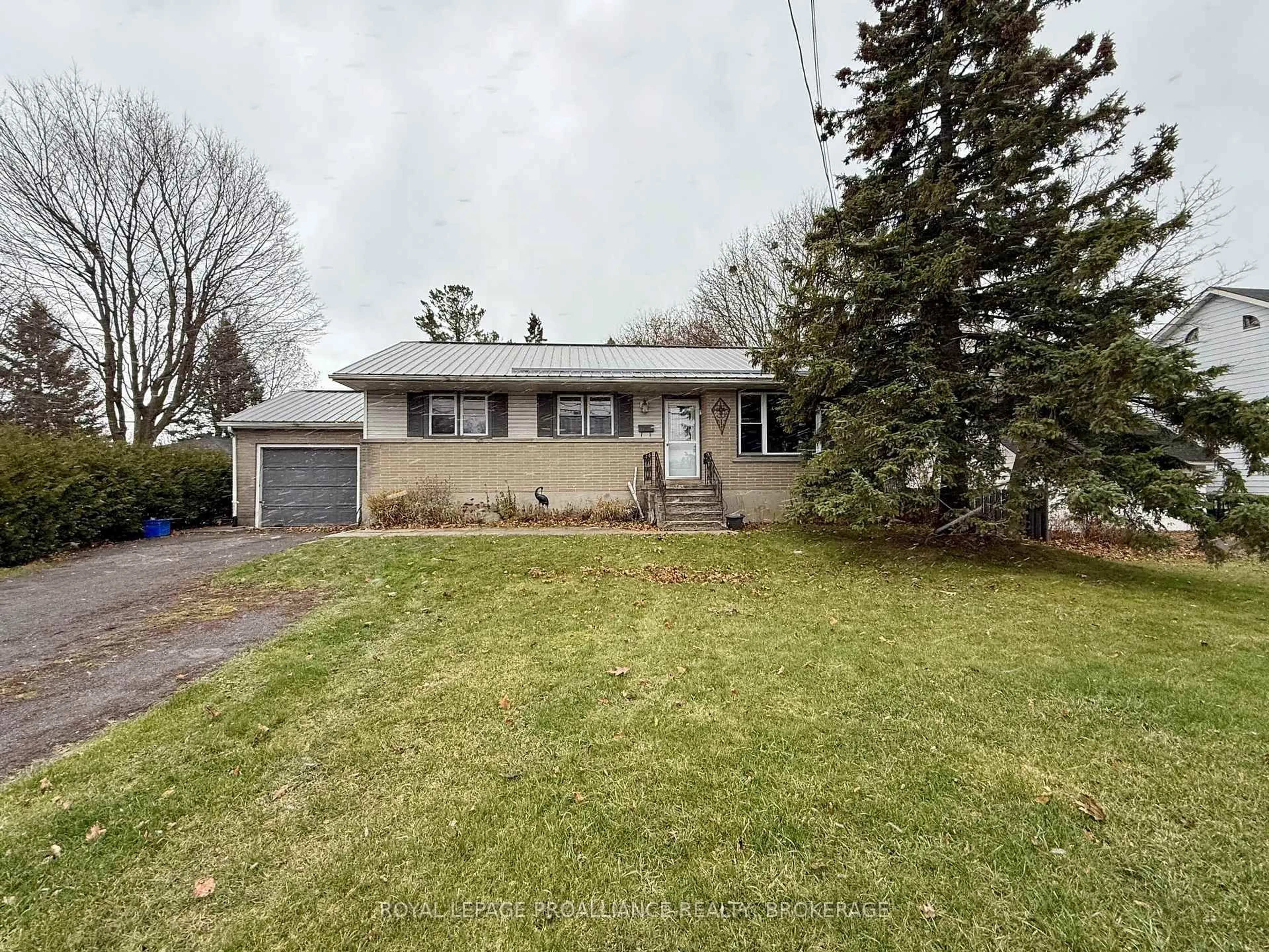 A pic from outside/outdoor area/front of a property/back of a property/a pic from drone, street for 725 Front Rd, Kingston Ontario K7M 5R6