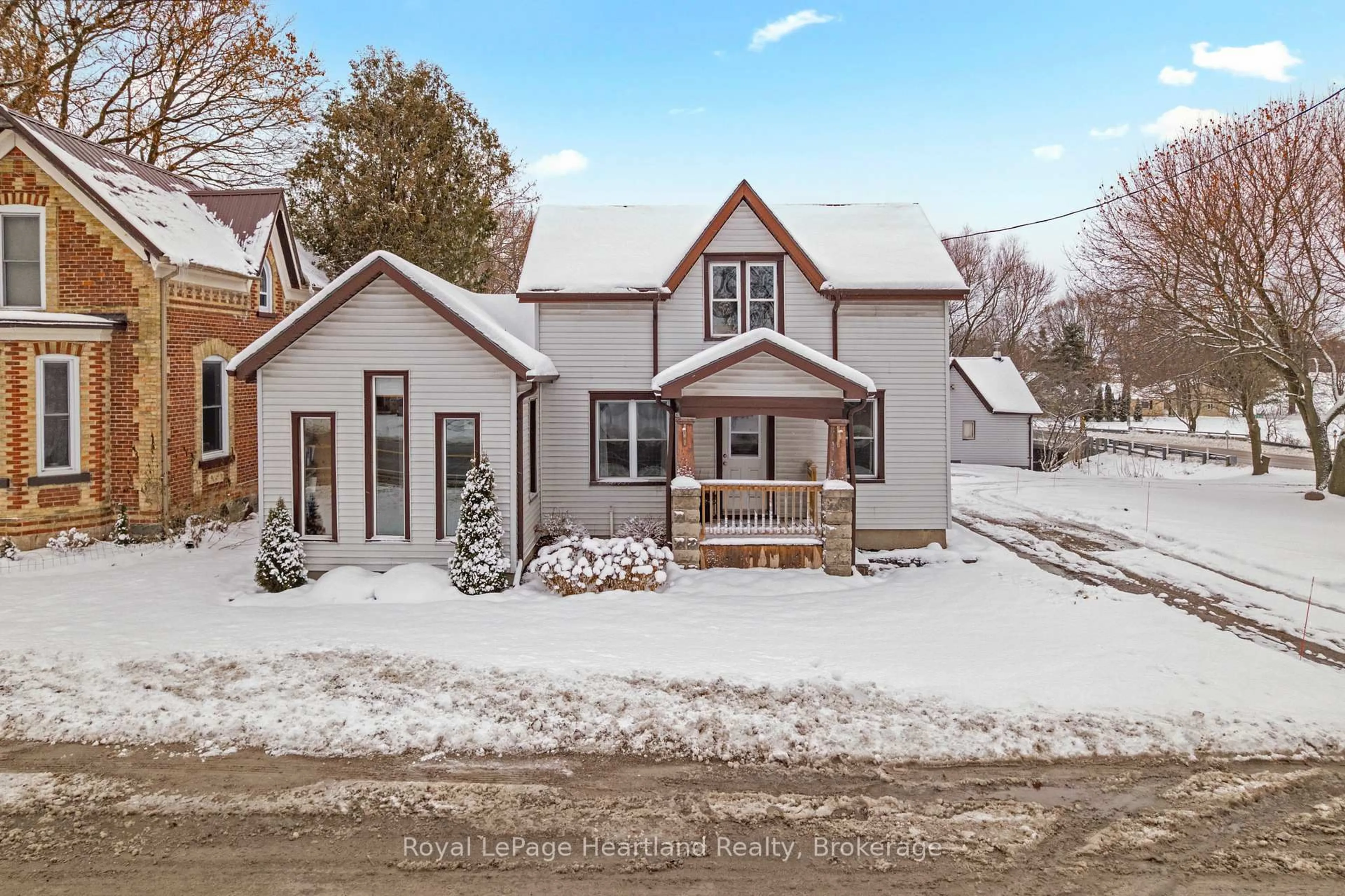 A pic from outside/outdoor area/front of a property/back of a property/a pic from drone, street for 70399 Perth Road 164, South Huron Ontario N0K 1K0