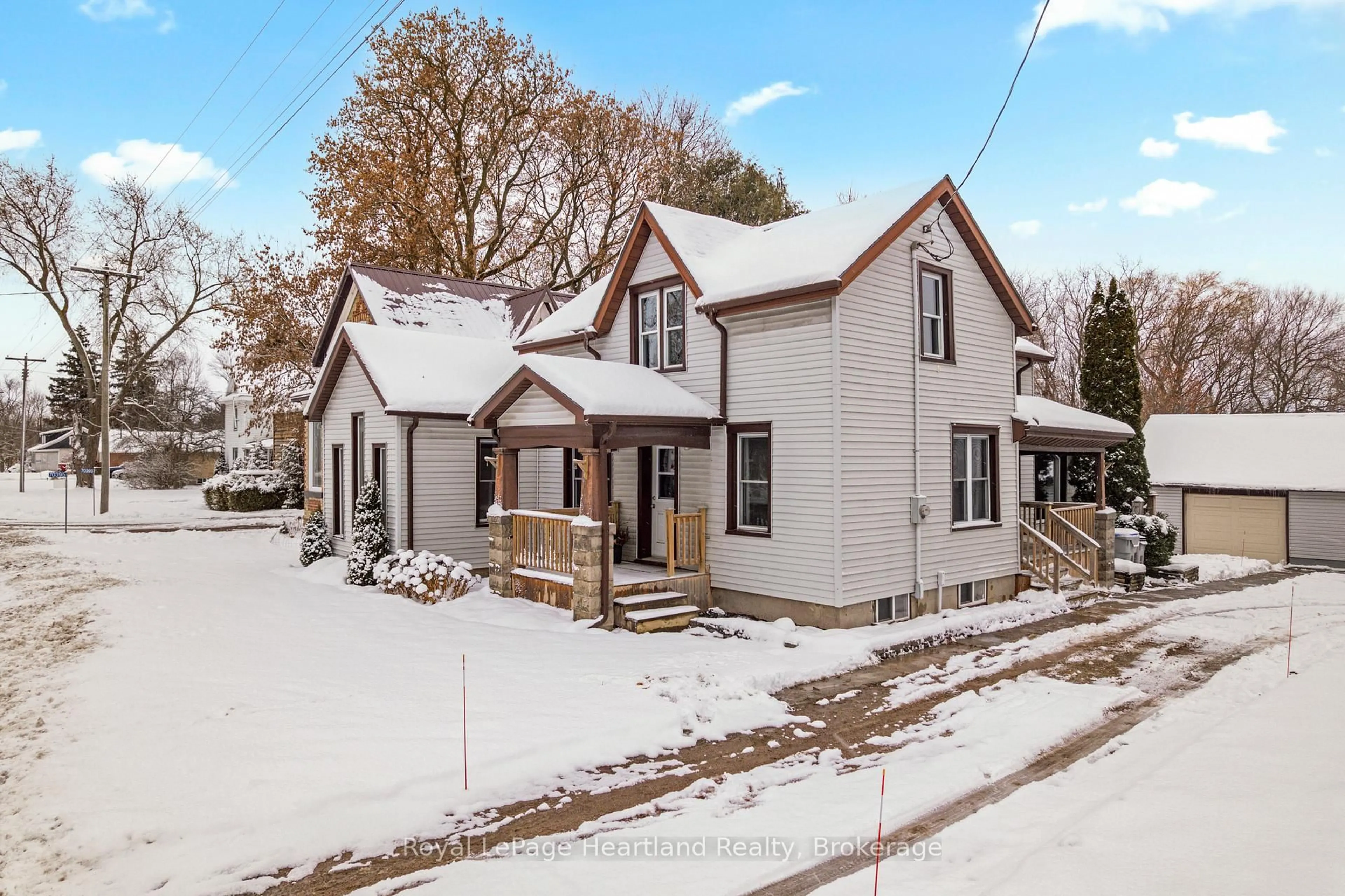 A pic from outside/outdoor area/front of a property/back of a property/a pic from drone, street for 70399 Perth Road 164, South Huron Ontario N0K 1K0