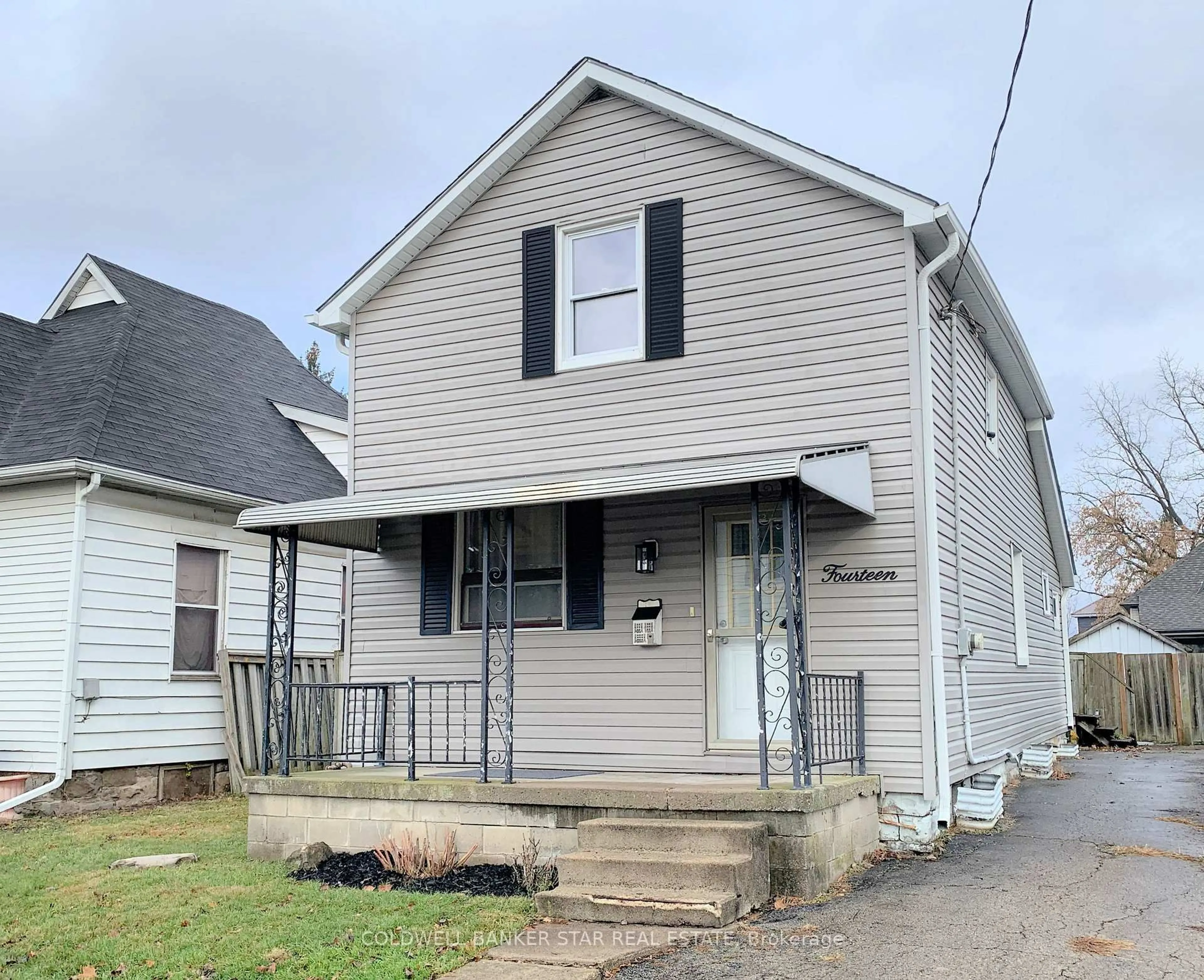 Home with vinyl exterior material, street for 14 Antrim St, St. Thomas Ontario N5P 1S3