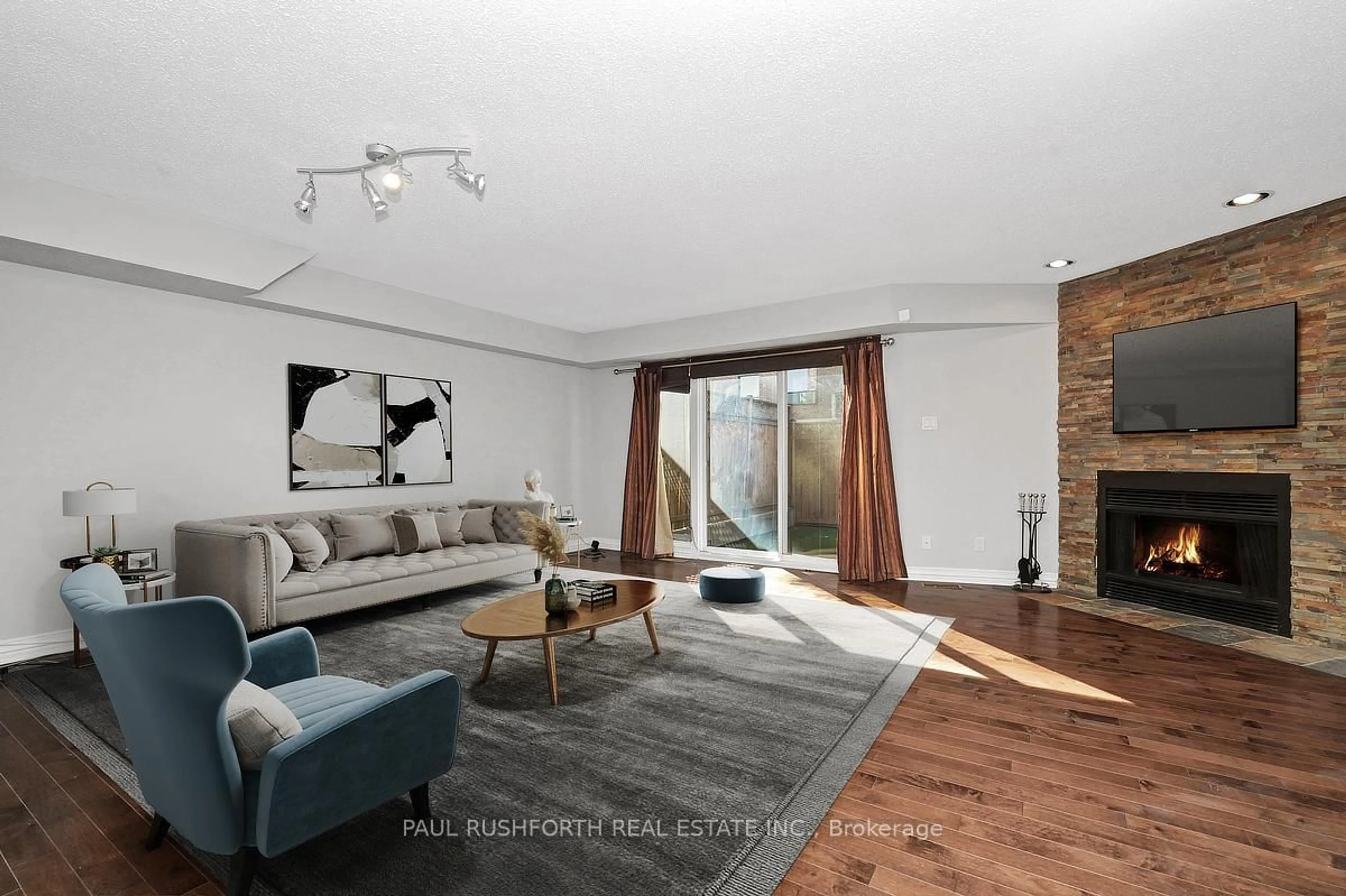 Living room with furniture, wood/laminate floor for 216 Forward Ave, Ottawa Ontario K1Y 1L2