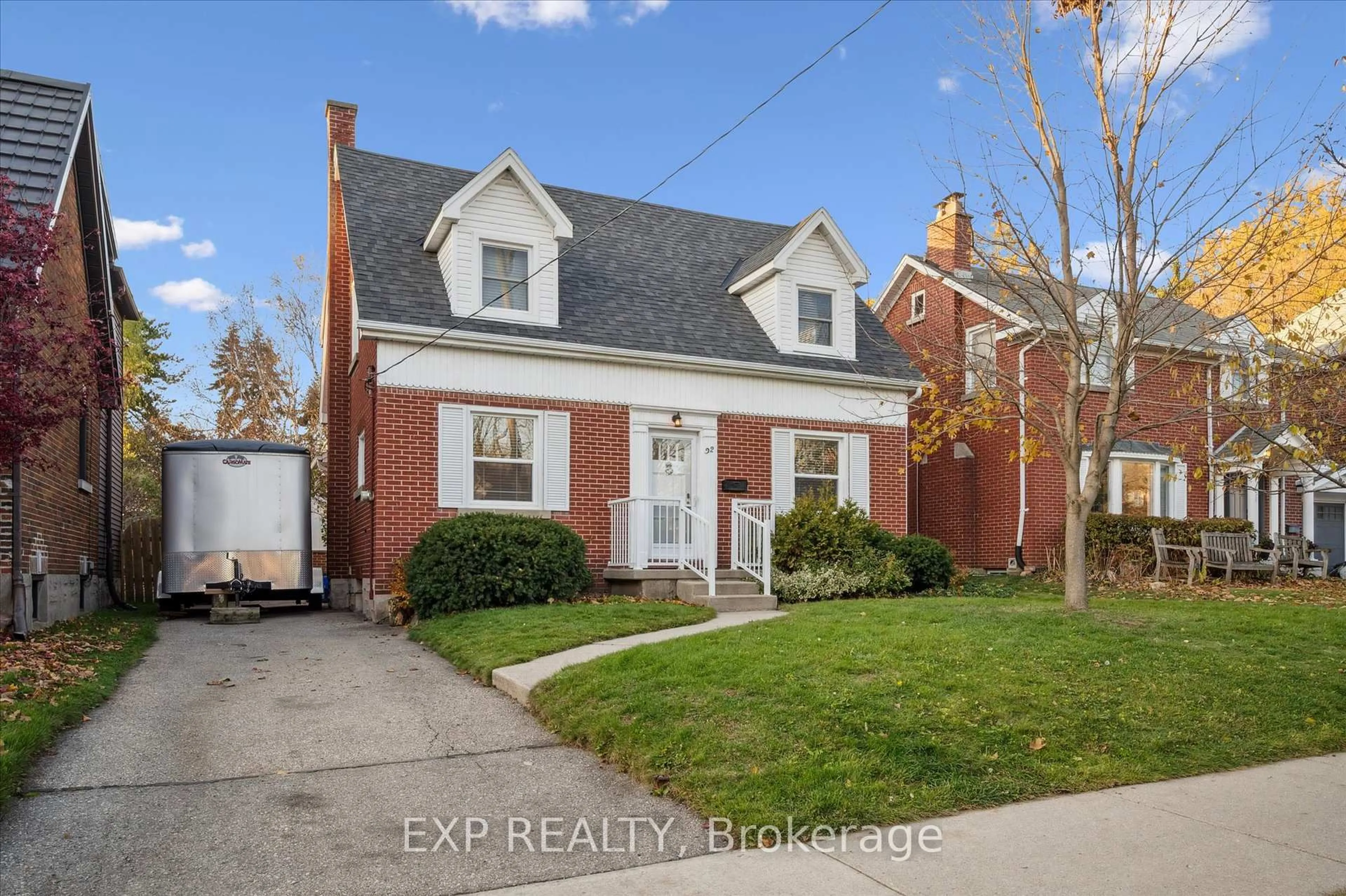 Home with brick exterior material, street for 92 Borden Ave, Kitchener Ontario N2H 3J4