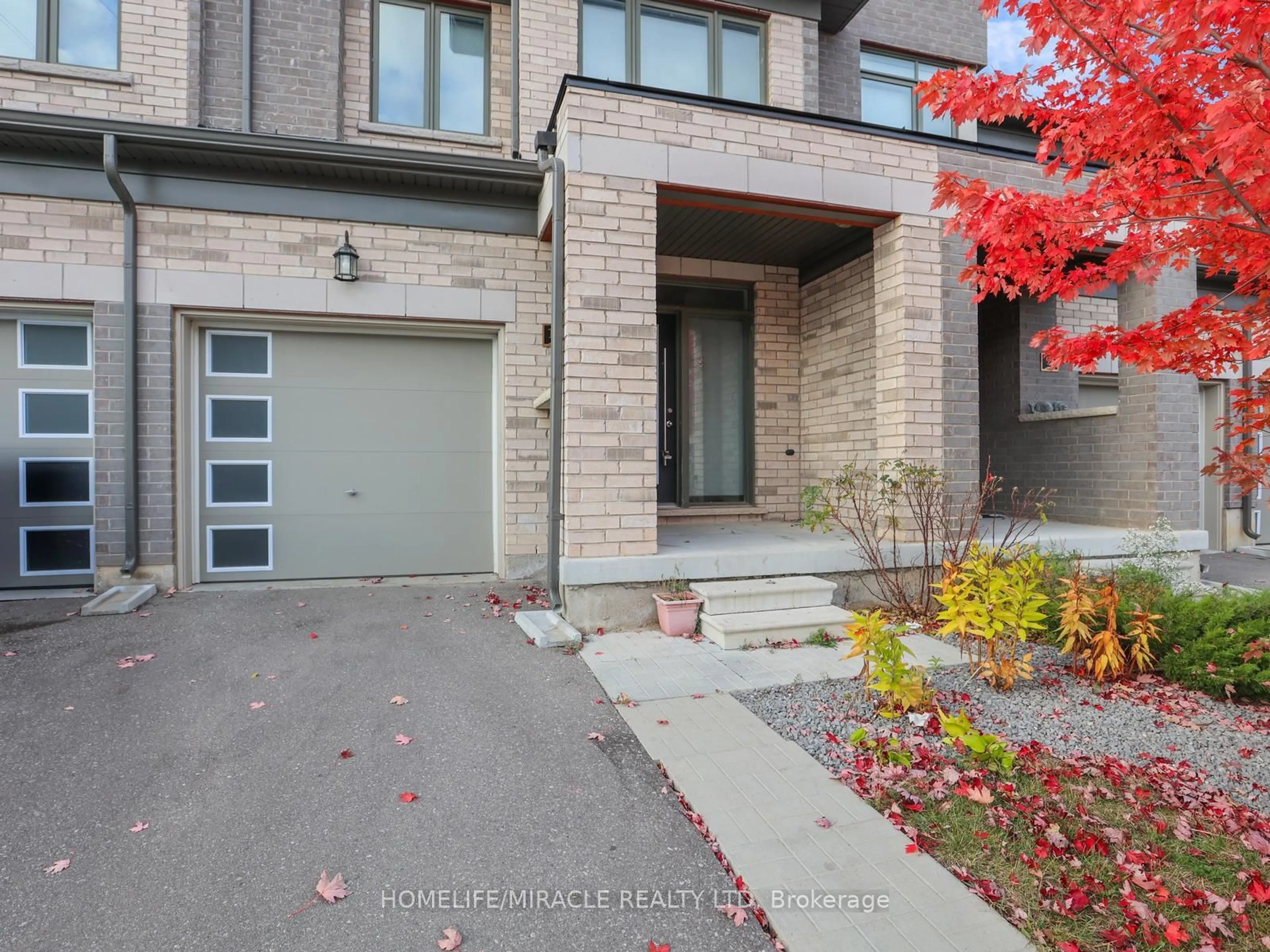 Home with brick exterior material, street for 166 Deerpath Dr #100, Guelph Ontario N1K 0E2