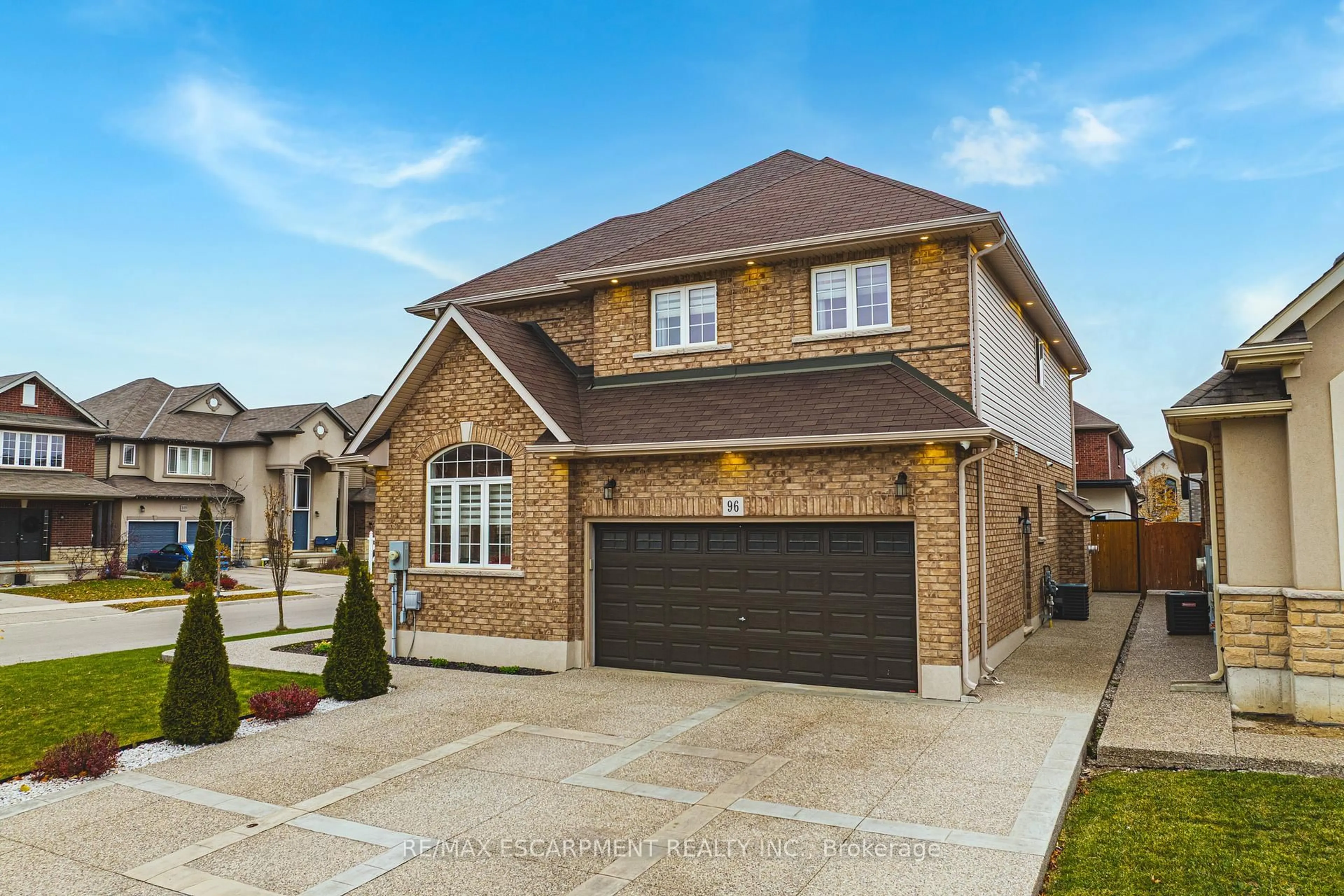 Home with brick exterior material, street for 96 Hidden Ridge Cres, Hamilton Ontario L9A 2X3