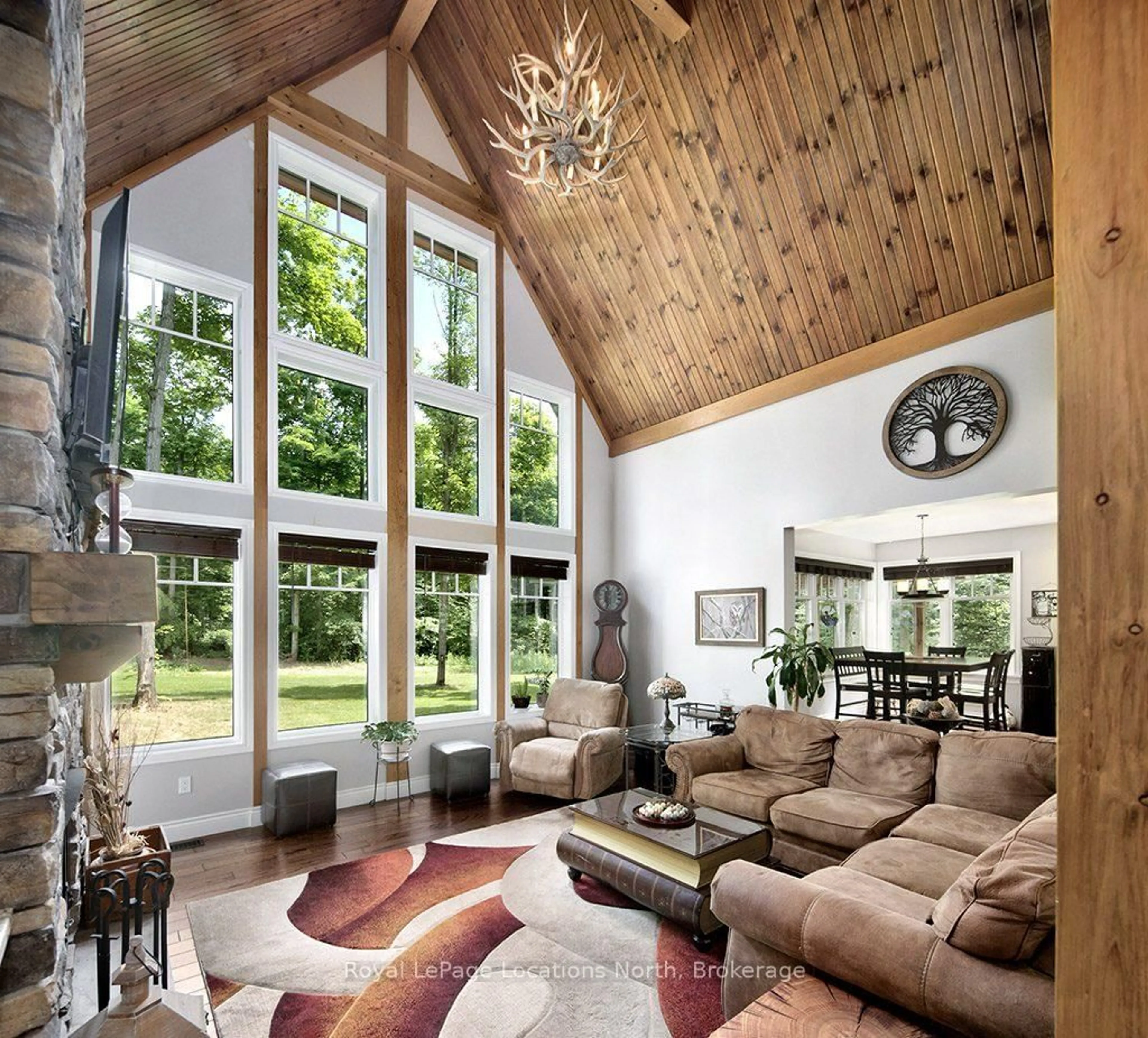 Living room with furniture, wood/laminate floor for 058151 12TH Line, Meaford Ontario N4L 1W5