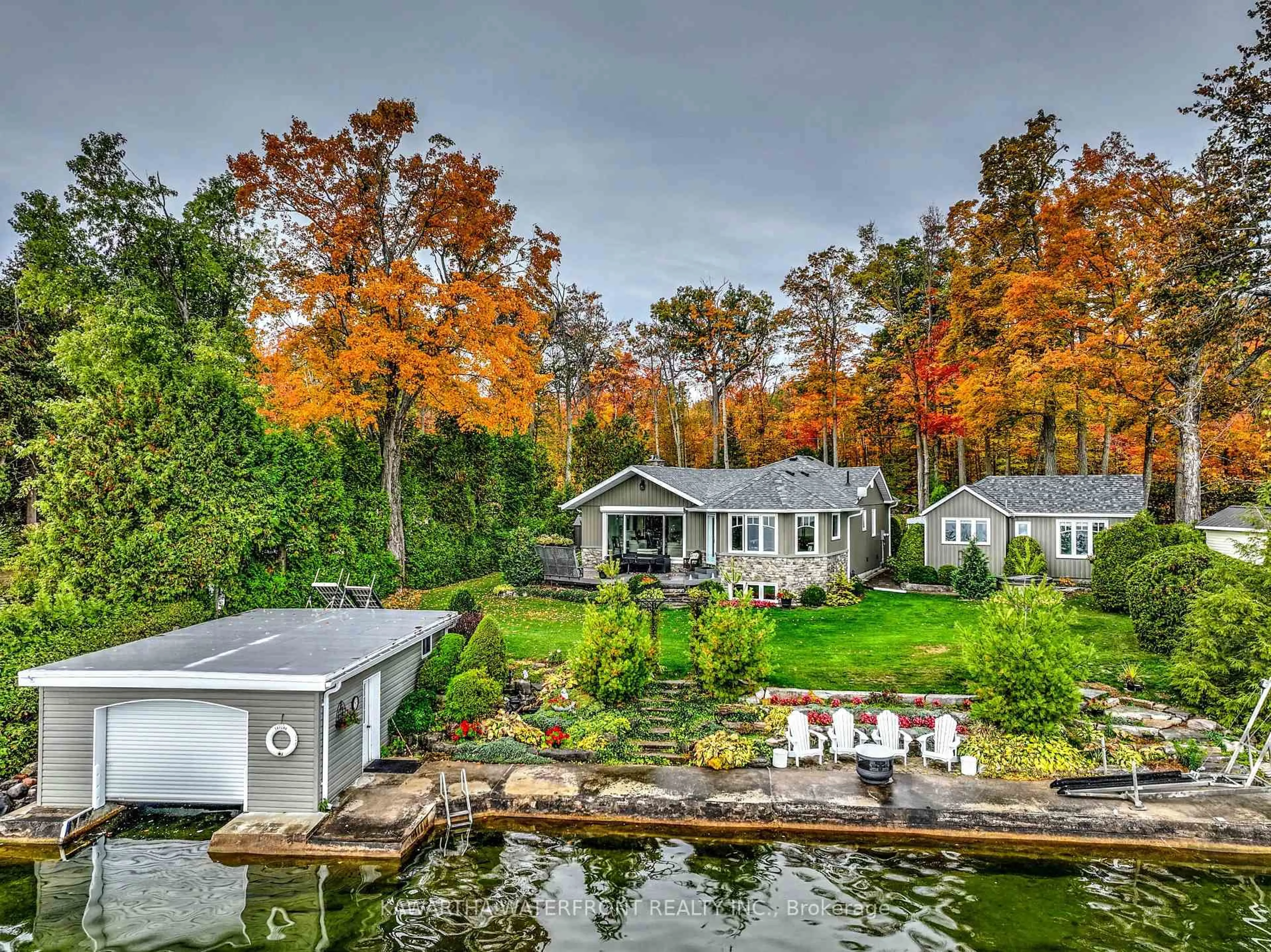 A pic from outside/outdoor area/front of a property/back of a property/a pic from drone, water/lake/river/ocean view for 48 Maple Ave, Kawartha Lakes Ontario K0M 2B0