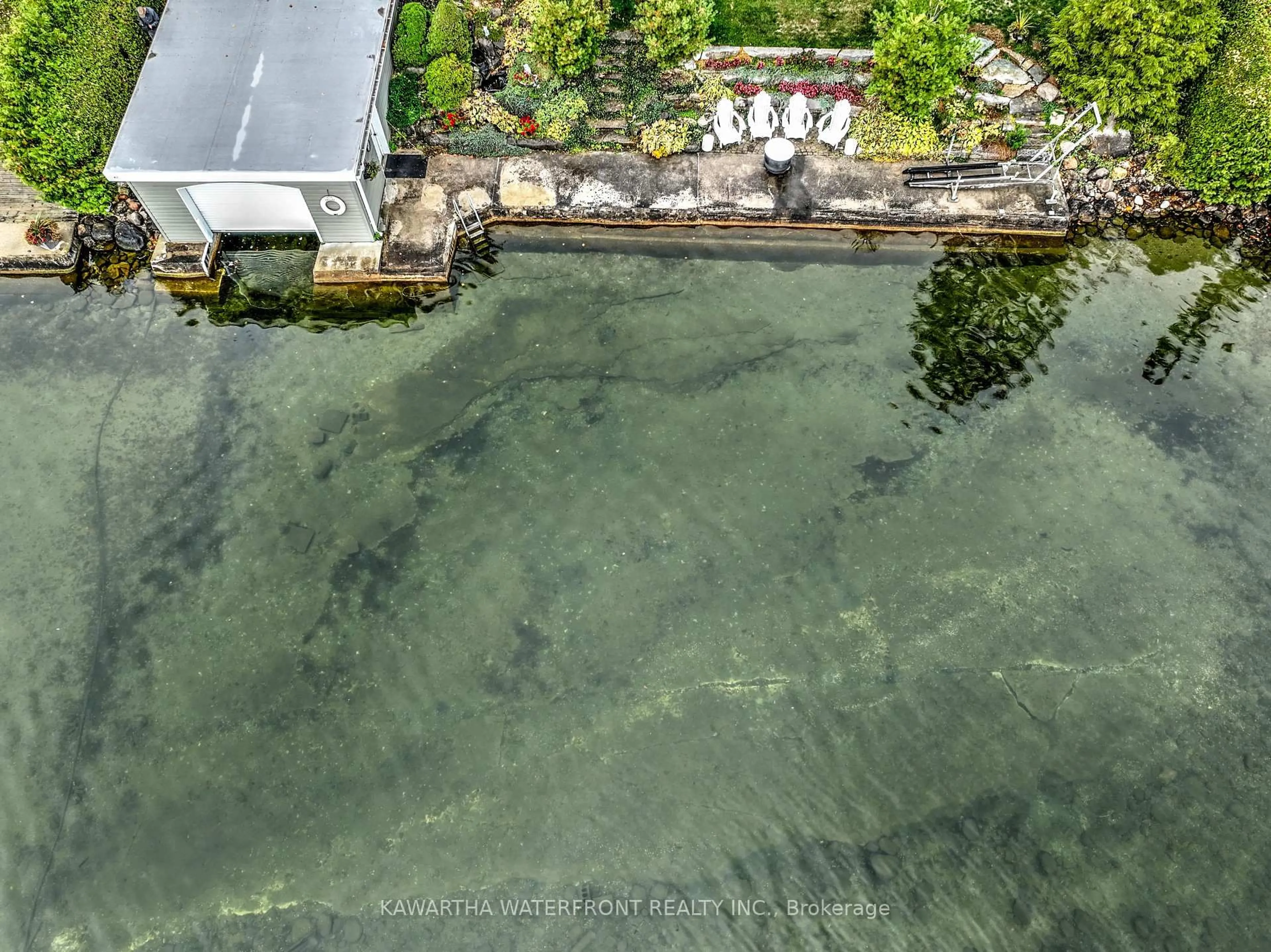 A pic from outside/outdoor area/front of a property/back of a property/a pic from drone, water/lake/river/ocean view for 48 Maple Ave, Kawartha Lakes Ontario K0M 2B0