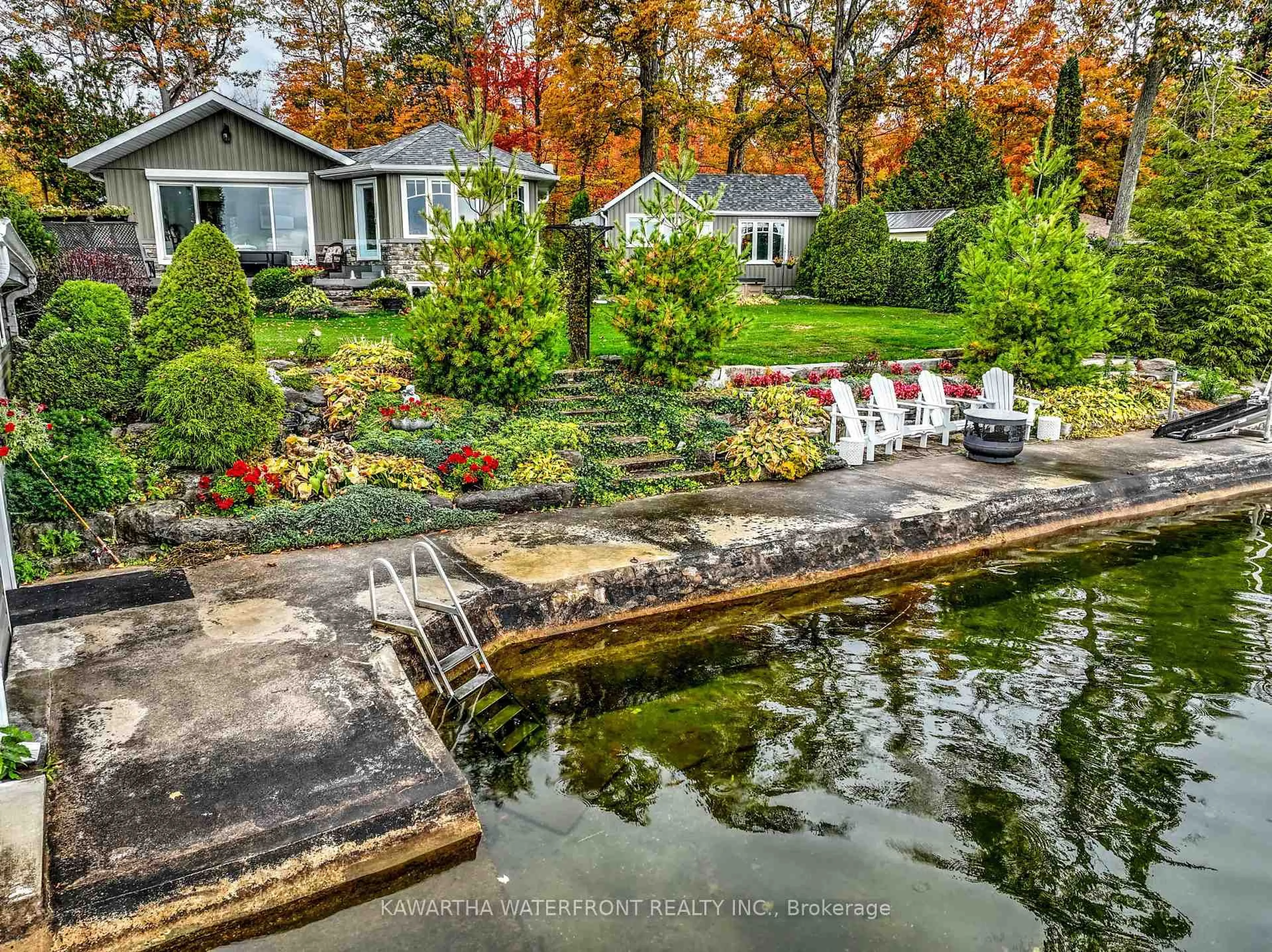A pic from outside/outdoor area/front of a property/back of a property/a pic from drone, water/lake/river/ocean view for 48 Maple Ave, Kawartha Lakes Ontario K0M 2B0