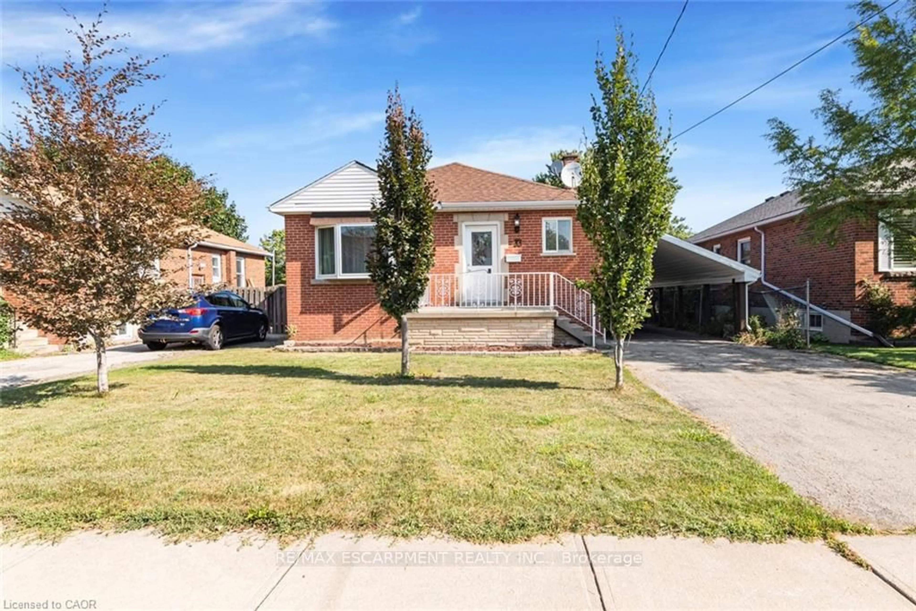 Home with brick exterior material, street for 33 Alderney Ave, Hamilton Ontario L9A 2A6