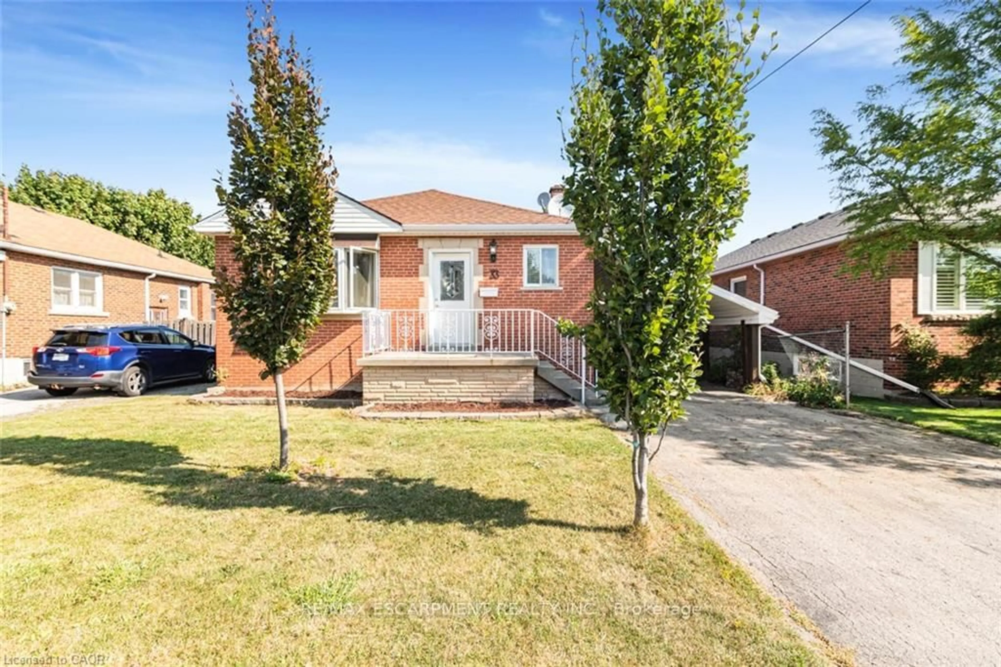 Home with brick exterior material, street for 33 Alderney Ave, Hamilton Ontario L9A 2A6