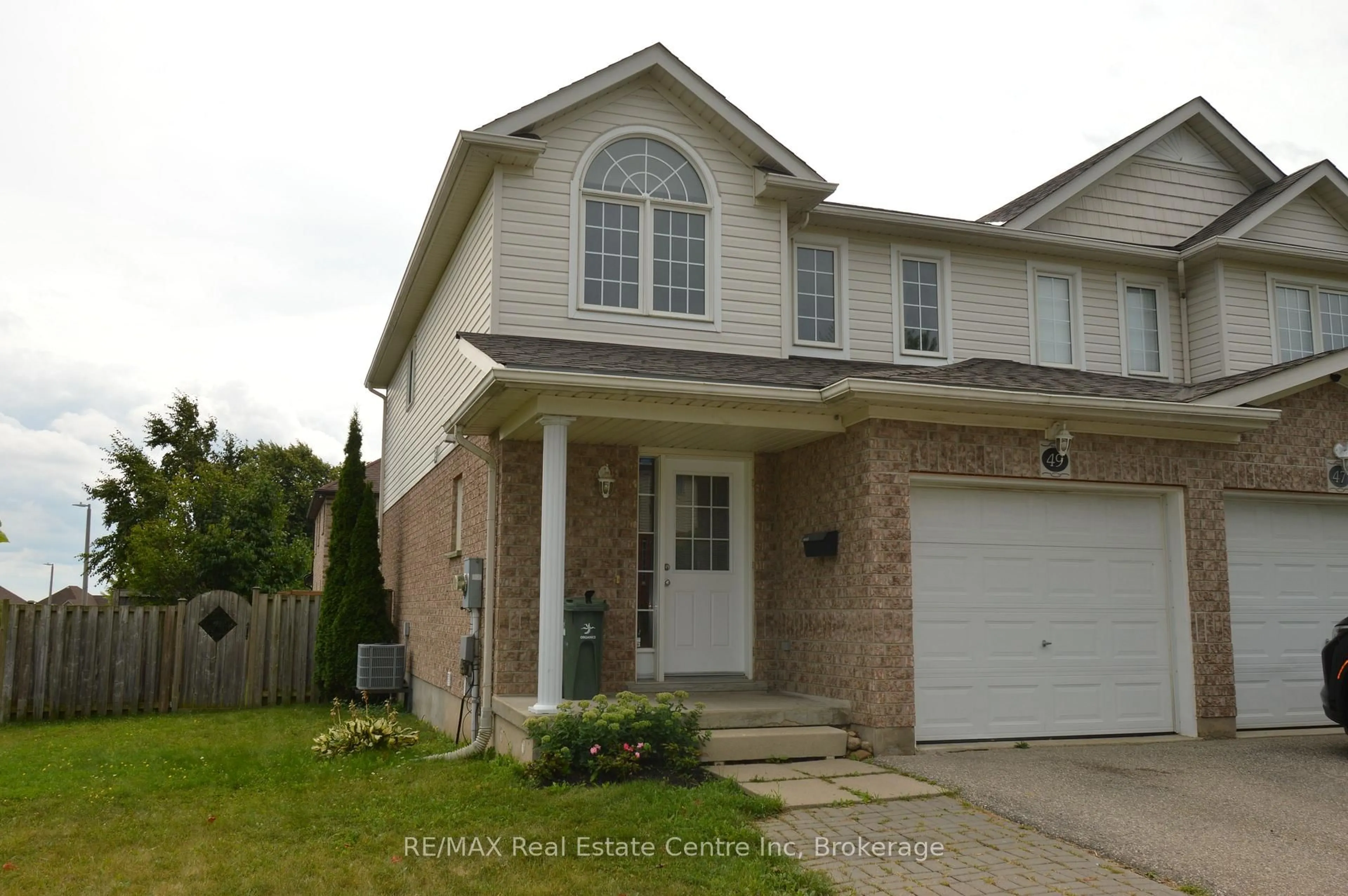 Home with vinyl exterior material, street for 49 Edwards St, Guelph Ontario N1E 0B8