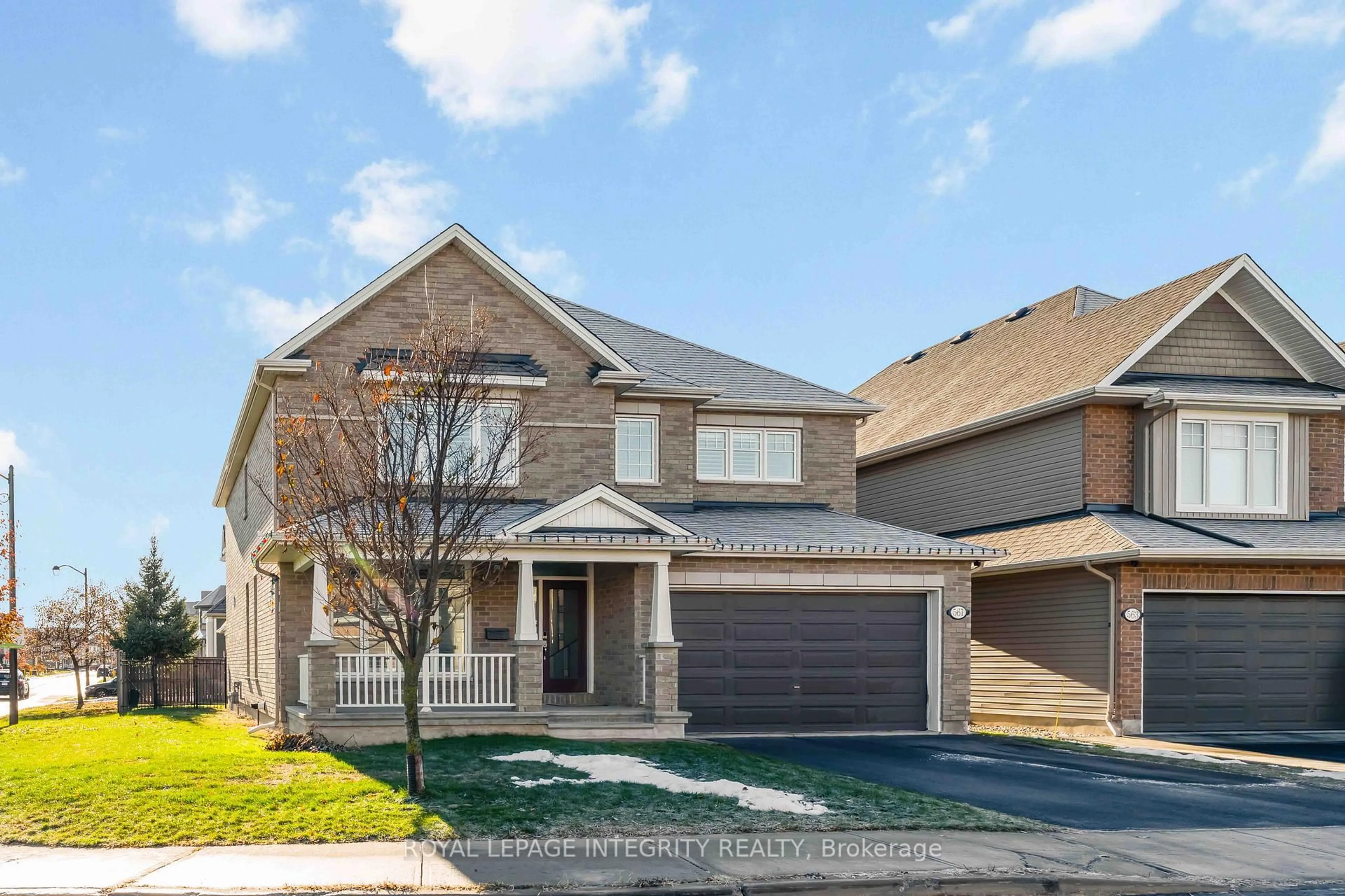 Home with brick exterior material, street for 561 Egret Way, Ottawa Ontario K2J 0E3