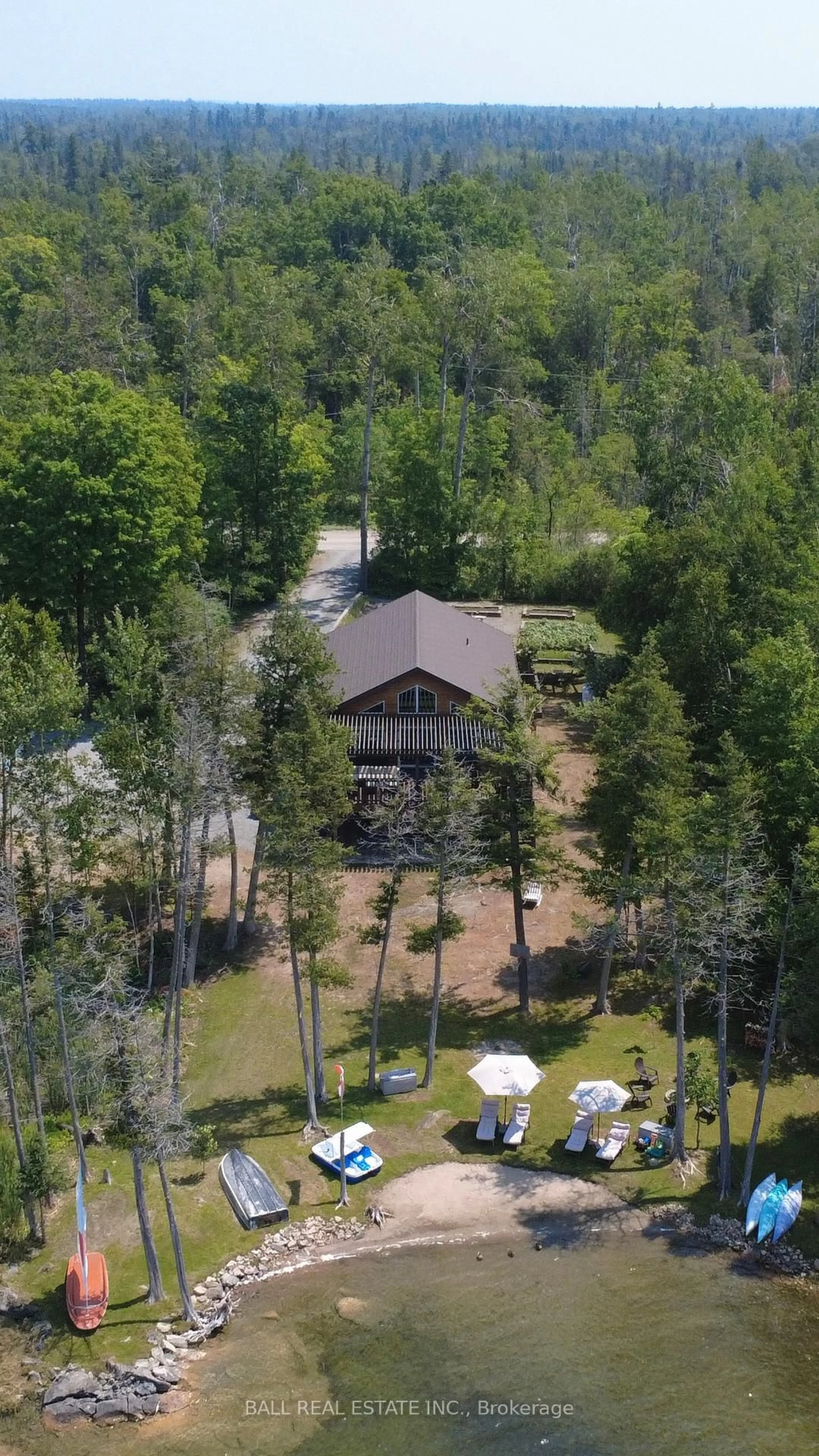 A pic from outside/outdoor area/front of a property/back of a property/a pic from drone, forest/trees view for 154 JULIAN LAKE Rd, North Kawartha Ontario K0L 3E0