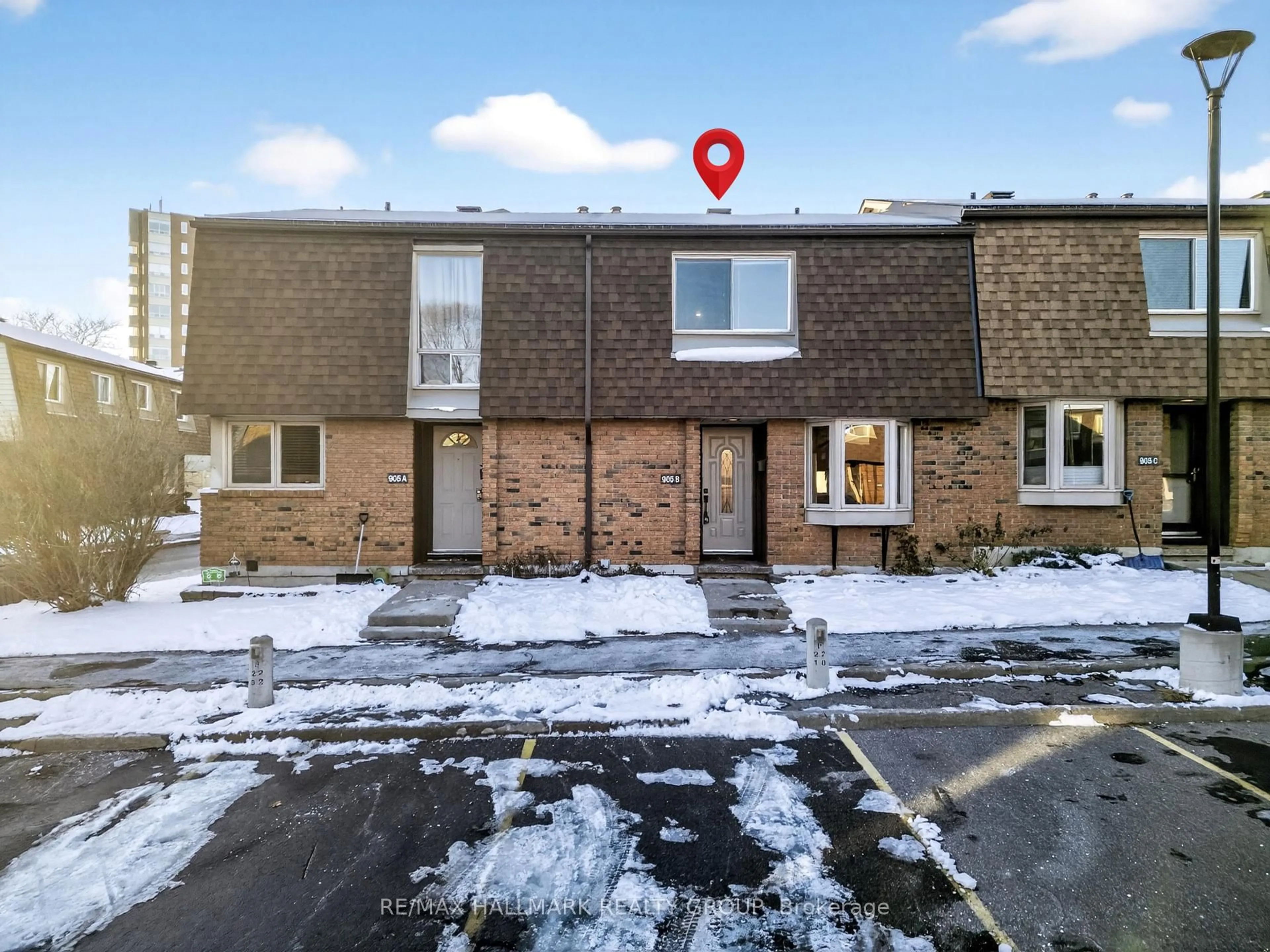 A pic from outside/outdoor area/front of a property/back of a property/a pic from drone, street for 905 Elmsmere Rd #B, Ottawa Ontario K1J 8G4