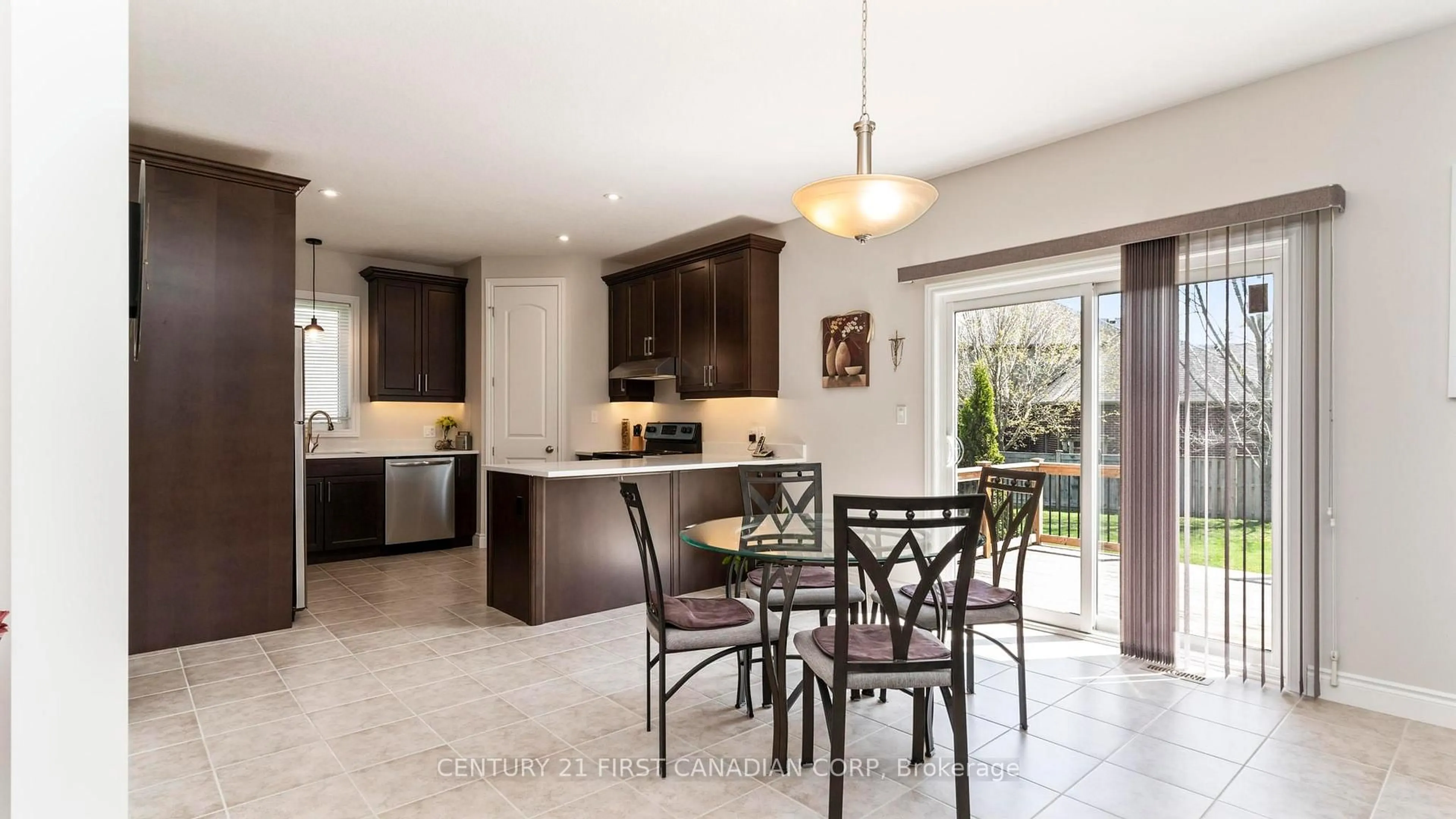 Open concept kitchen, ceramic/tile floor for 102 Caverhill Cres, Middlesex Centre Ontario N0L 1R0