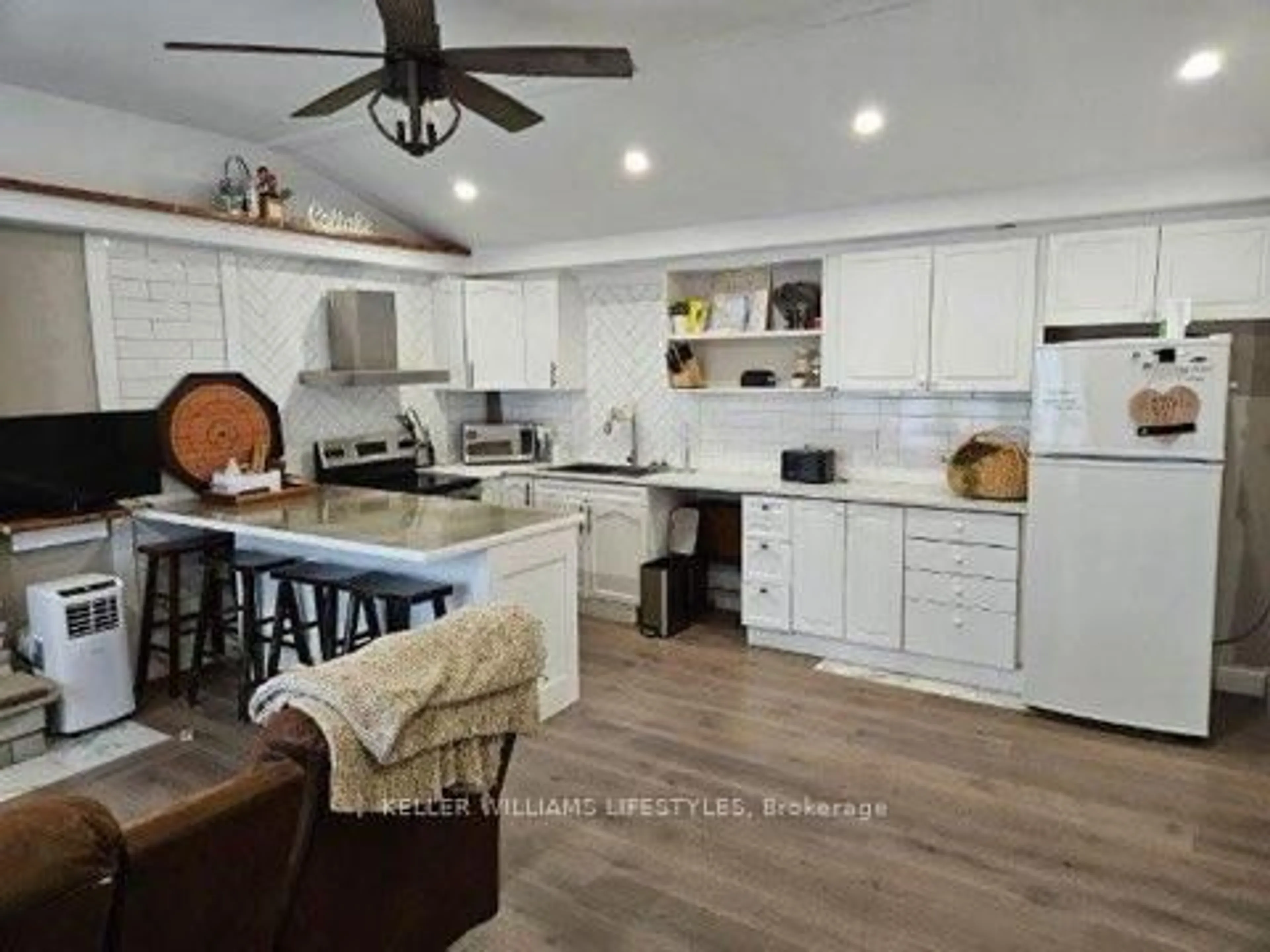 Open concept kitchen, wood/laminate floor for 71454 Shoreline Dr, Bluewater Ontario N0M 1N0