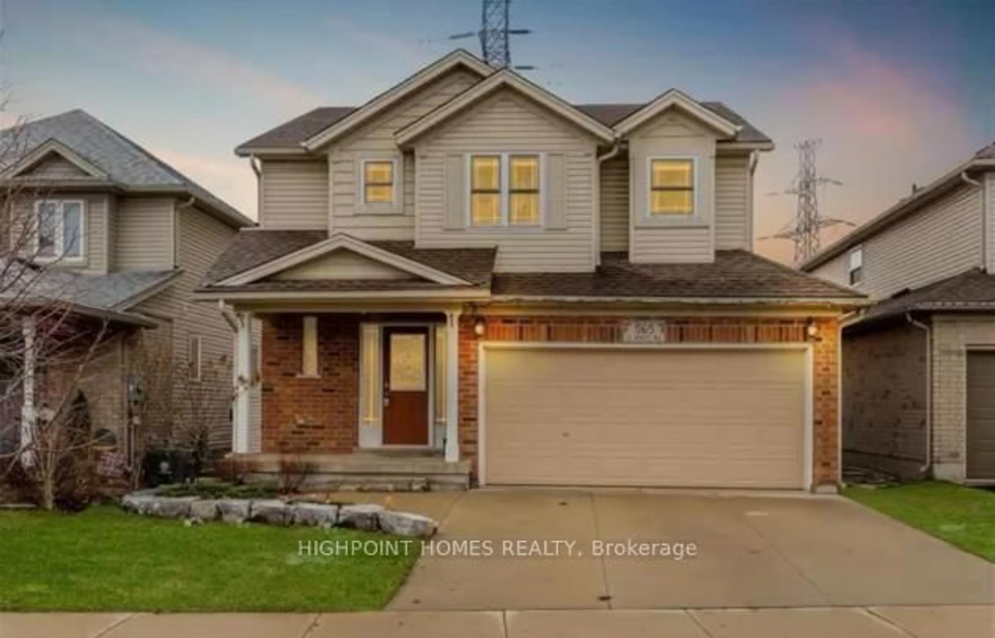 Home with brick exterior material, street for 565 St. Moritz Ave, Waterloo Ontario N2T 2Z3