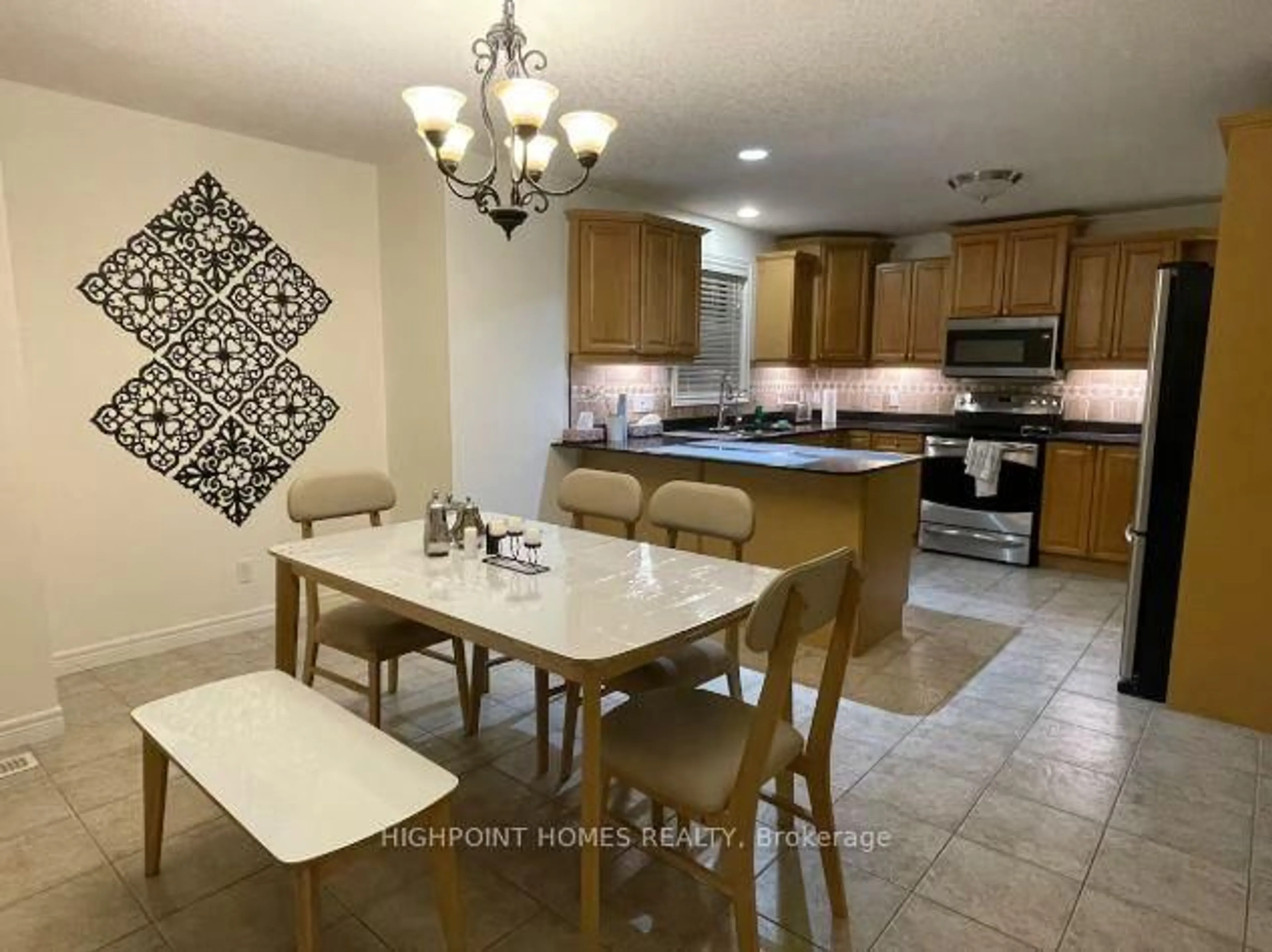 Open concept kitchen, ceramic/tile floor for 565 St. Moritz Ave, Waterloo Ontario N2T 2Z3