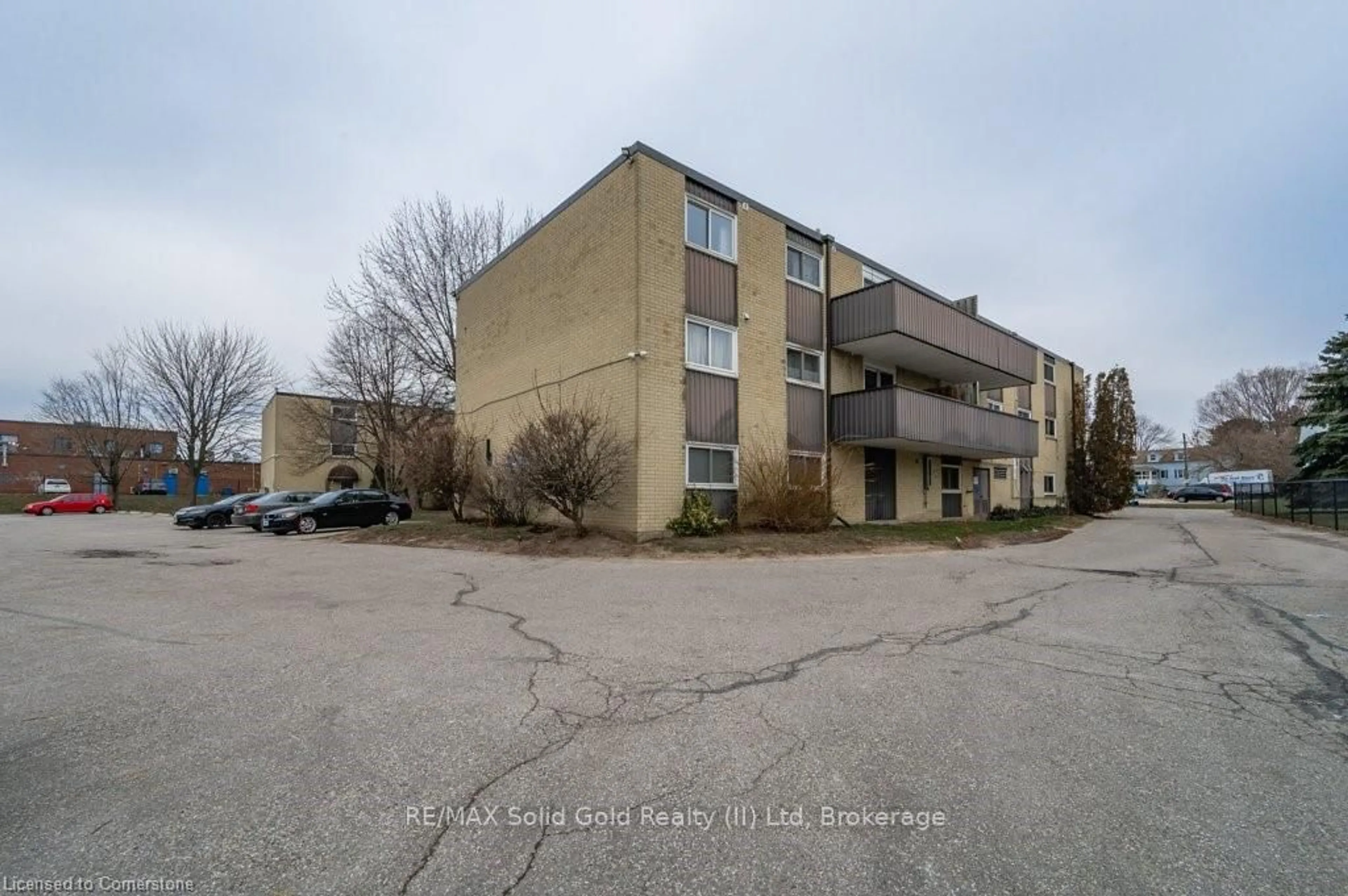A pic from outside/outdoor area/front of a property/back of a property/a pic from drone, building for 75 Hazelglen Dr #308, Kitchener Ontario N2M 2E2