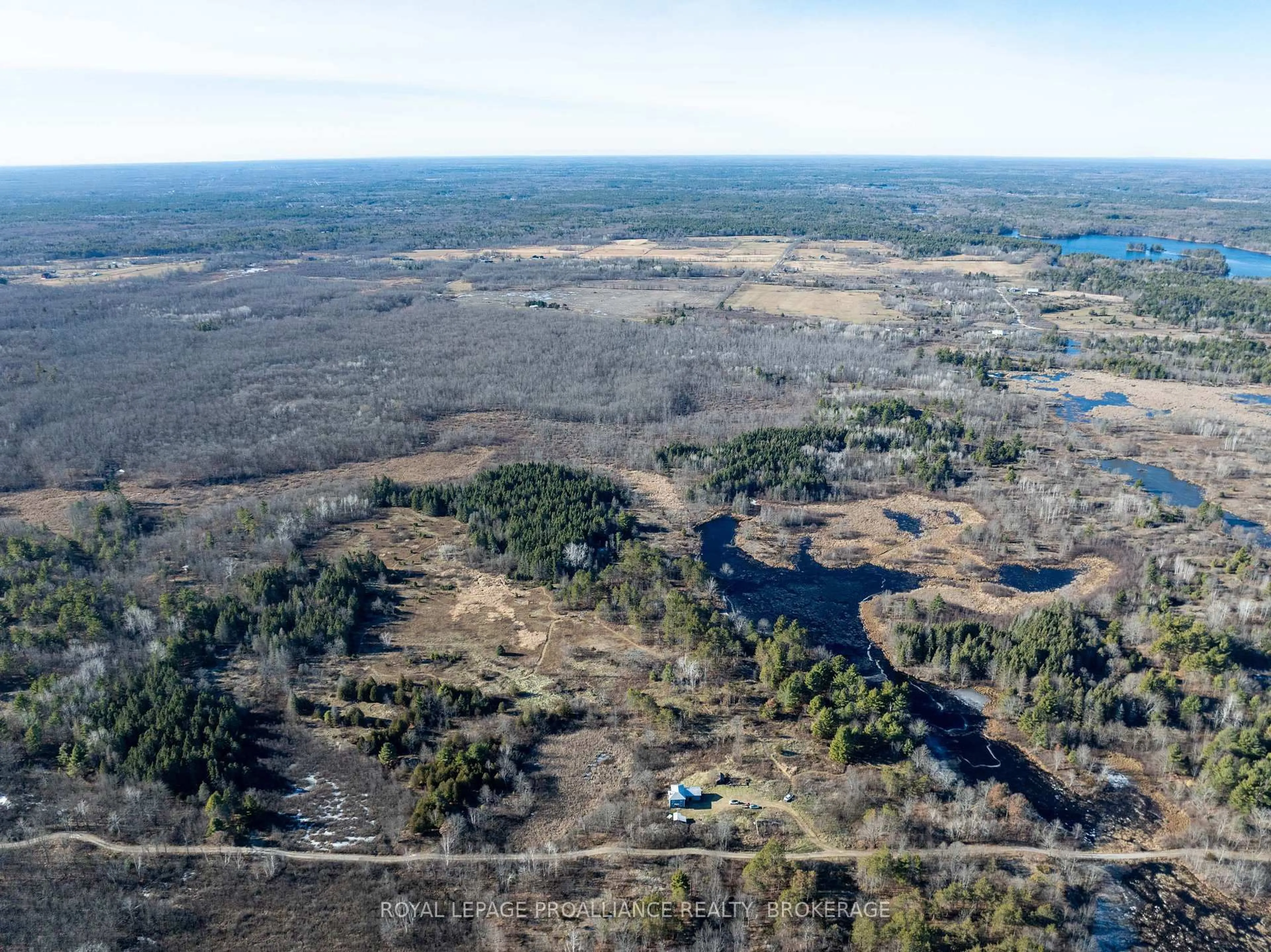A pic from outside/outdoor area/front of a property/back of a property/a pic from drone, water/lake/river/ocean view for 1236 Davey Rd, Sydenham Ontario K0H 2T0