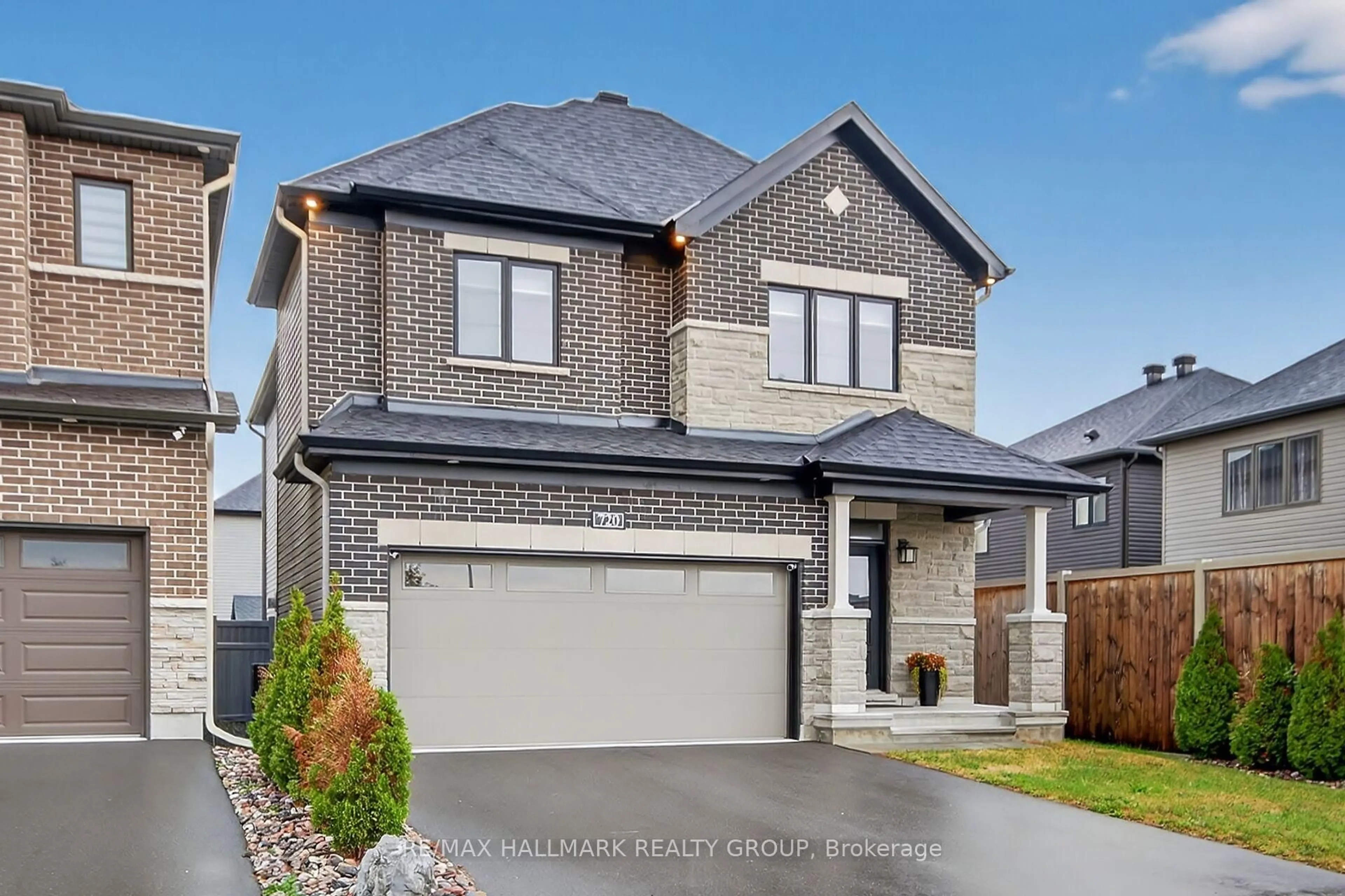 Home with brick exterior material, street for 720 Cappamore Dr, Ottawa Ontario K2J 6W3