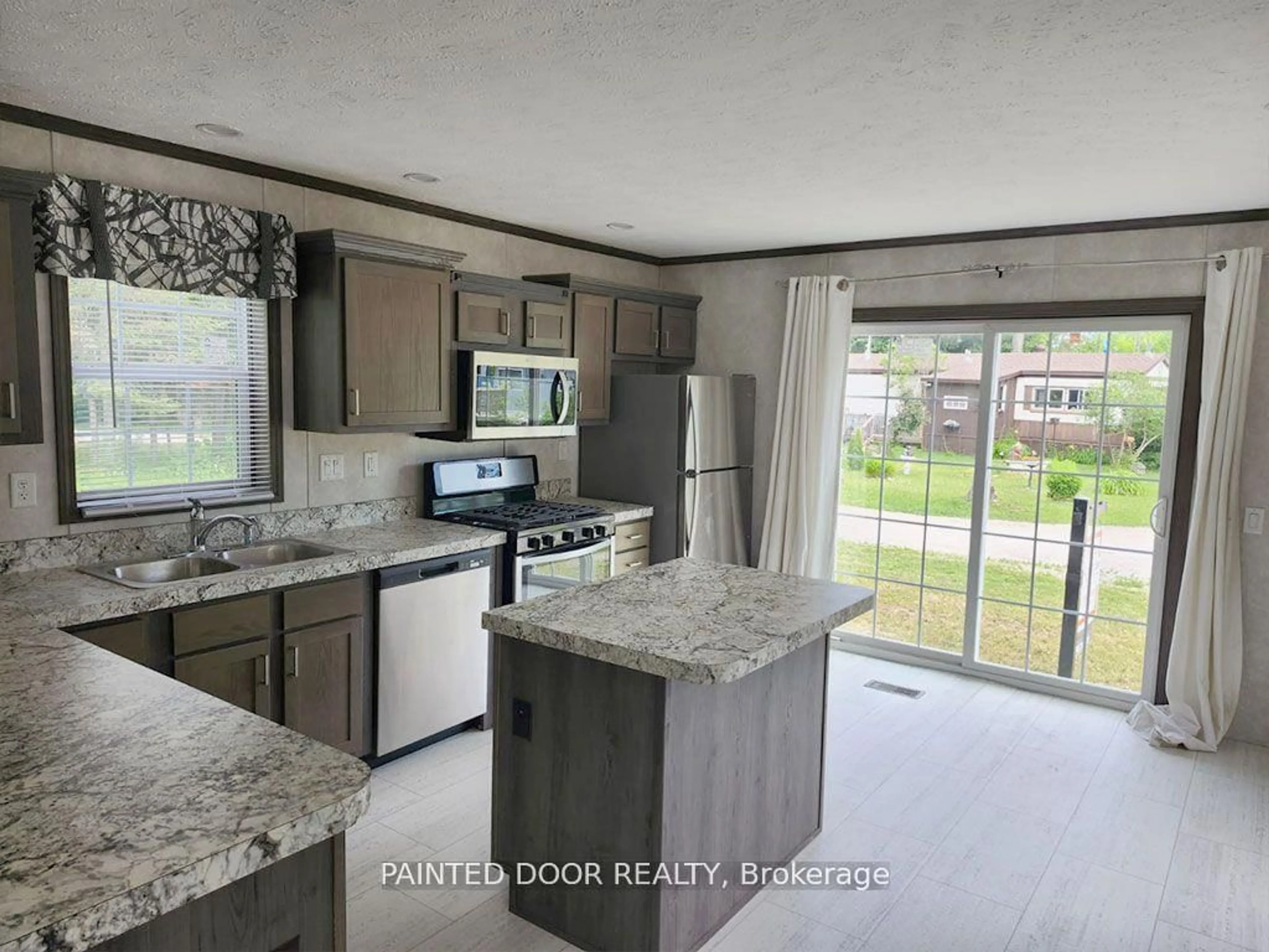 Open concept kitchen, ceramic/tile floor for 45 Tower Rd #Unit #4, Georgian Bay Ontario P0C 1H0