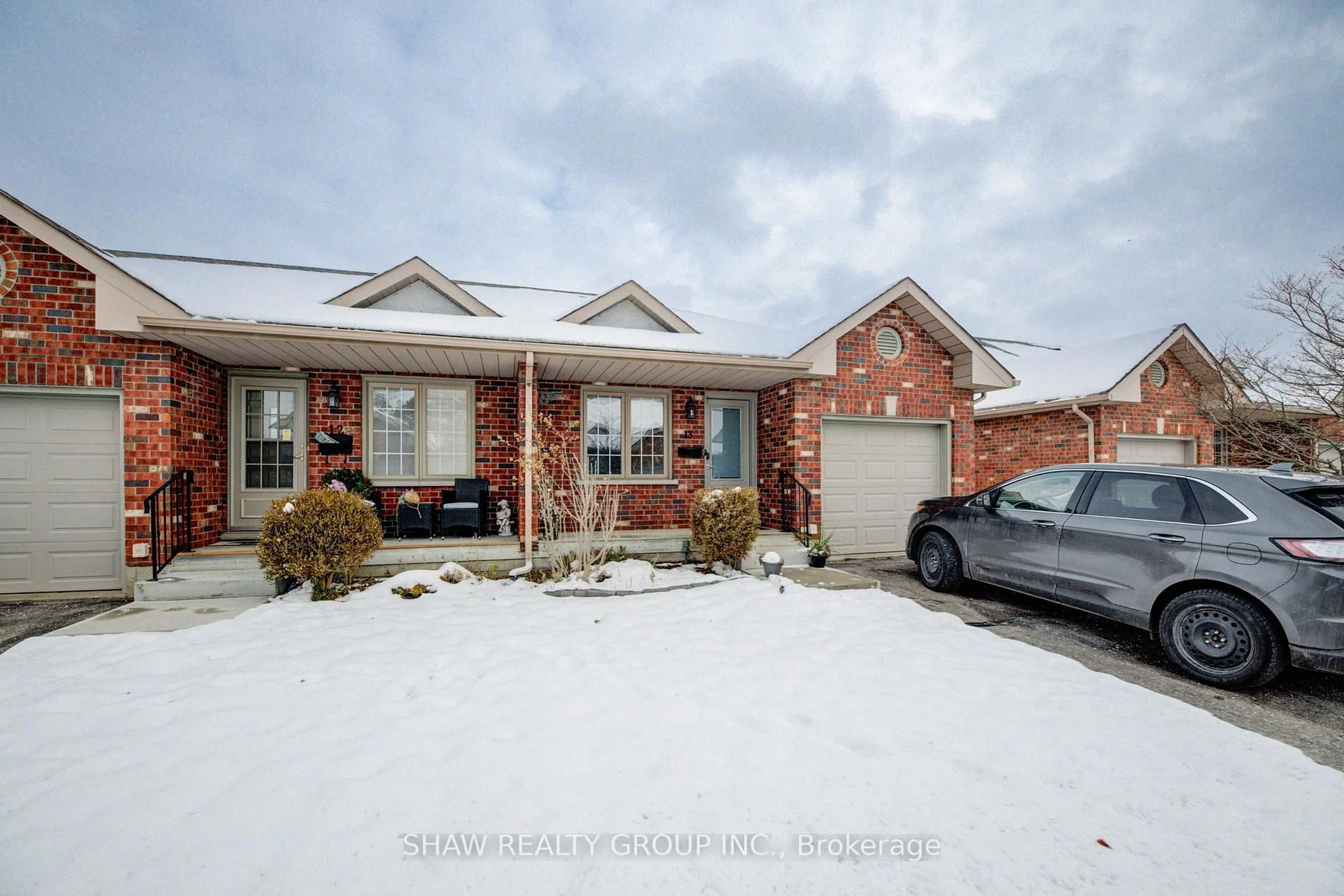 Home with brick exterior material, street for 694 Grey St #13, Brantford Ontario N3S 4Y4