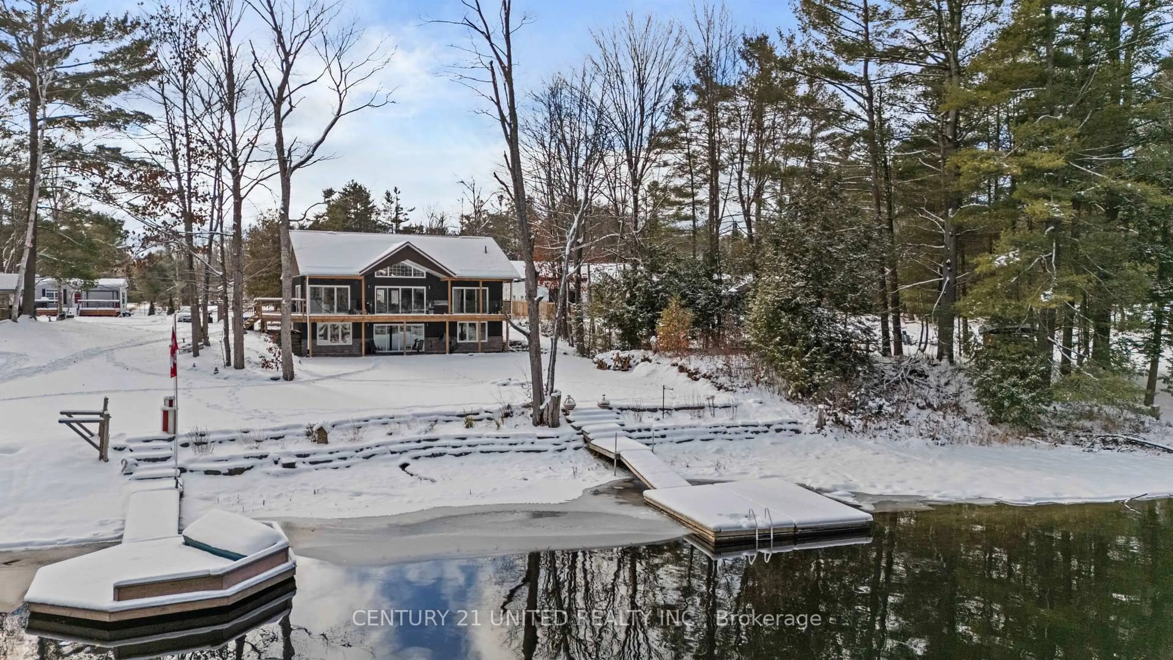 A pic from outside/outdoor area/front of a property/back of a property/a pic from drone, water/lake/river/ocean view for 7544 Highway 35, Kawartha Lakes Ontario K0M 2L0