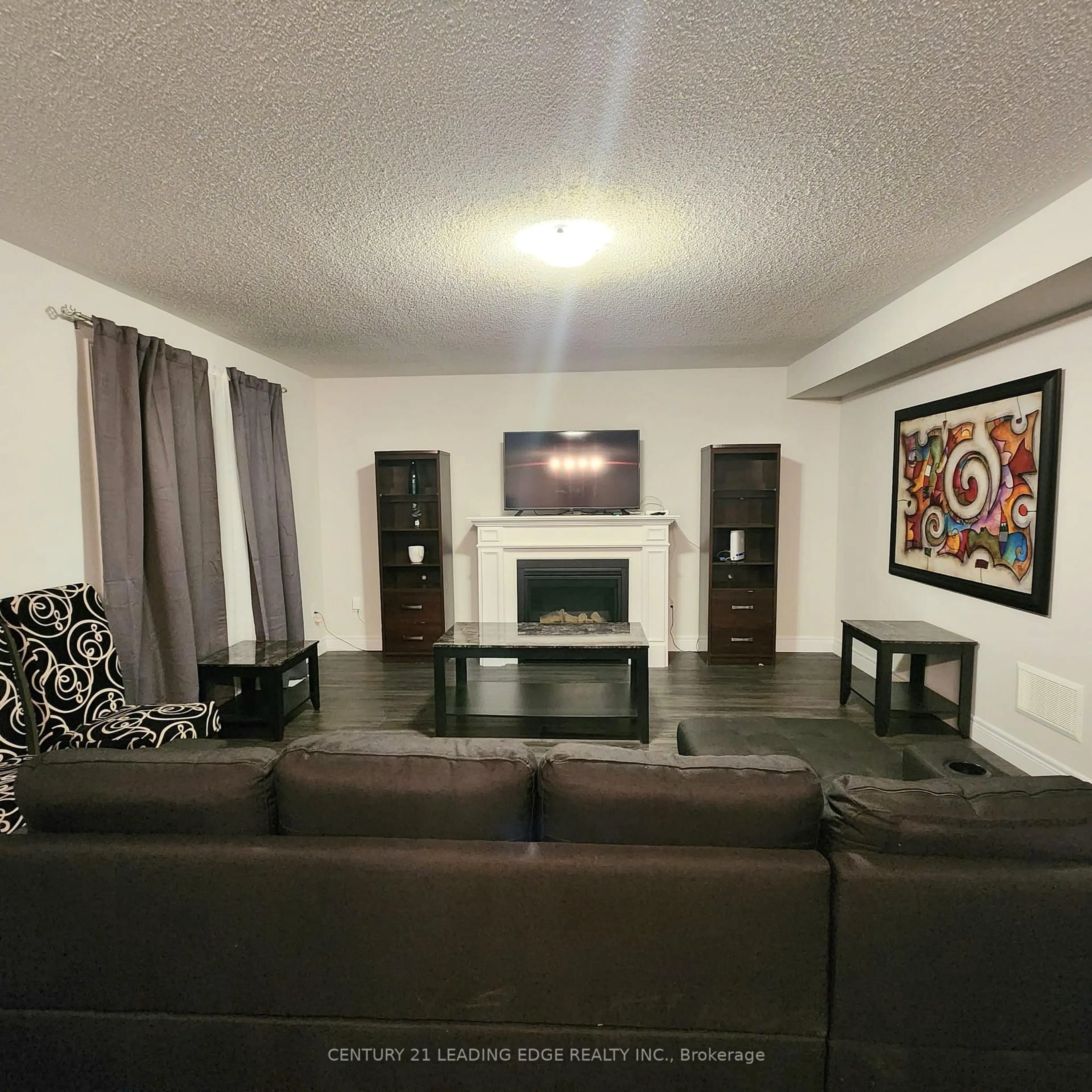 Living room with furniture, unknown for 180 Wild Rose Dr, Gravenhurst Ontario P1P 0B4