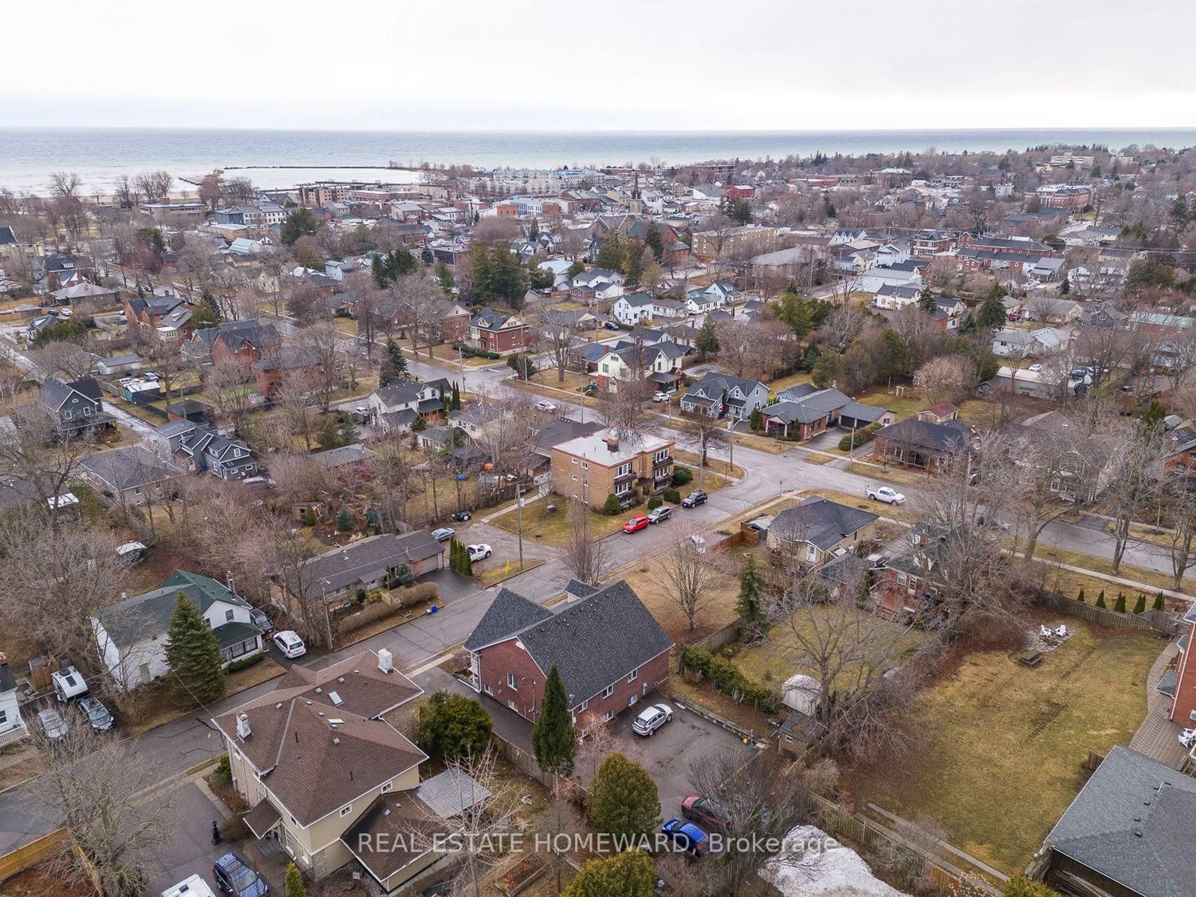 A pic from outside/outdoor area/front of a property/back of a property/a pic from drone, water/lake/river/ocean view for 106 Anne St #102, Cobourg Ontario K9A 1G5