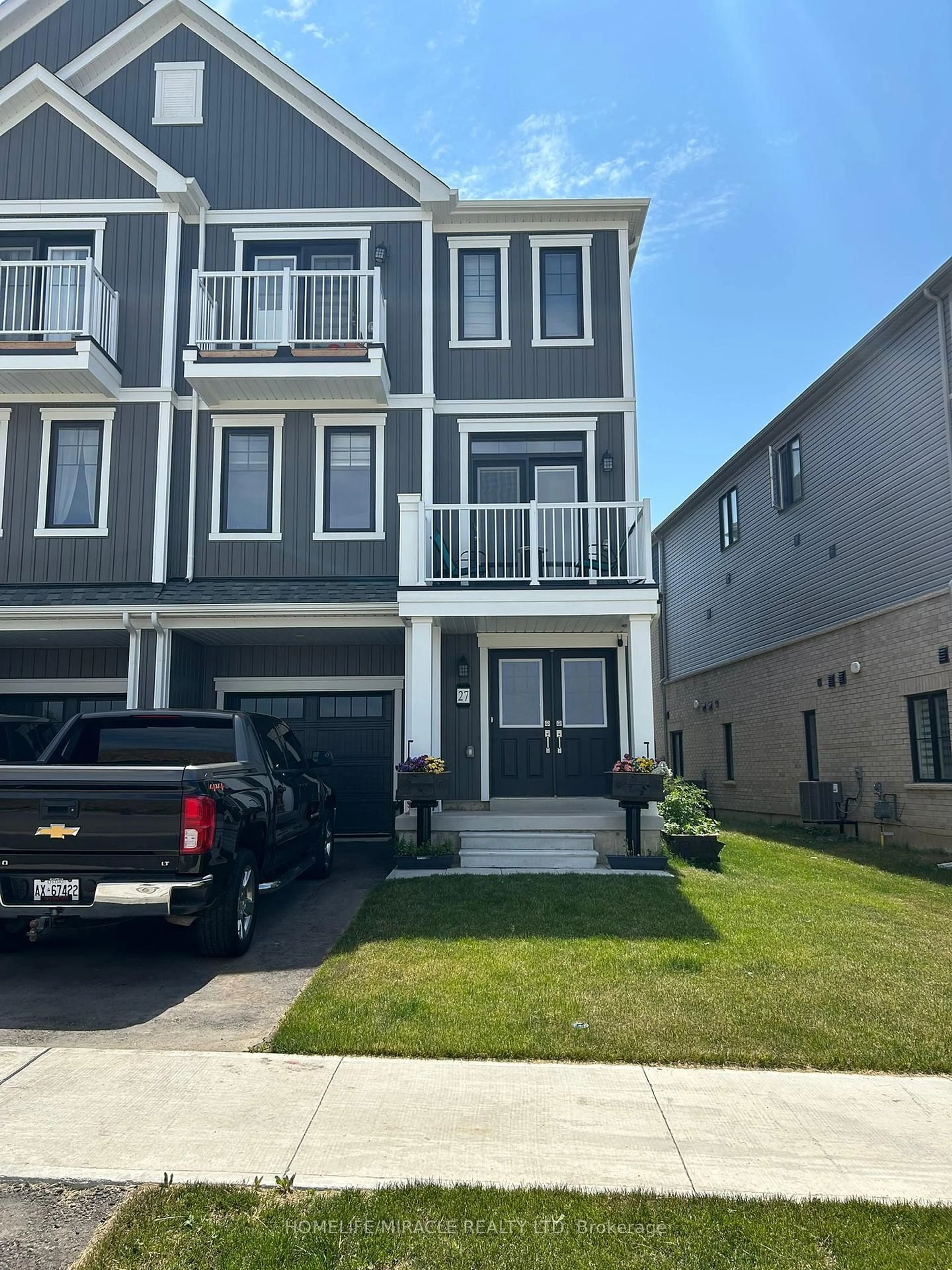 Home with vinyl exterior material, street for 27 Central Market Dr, Haldimand Ontario N3W 0J3