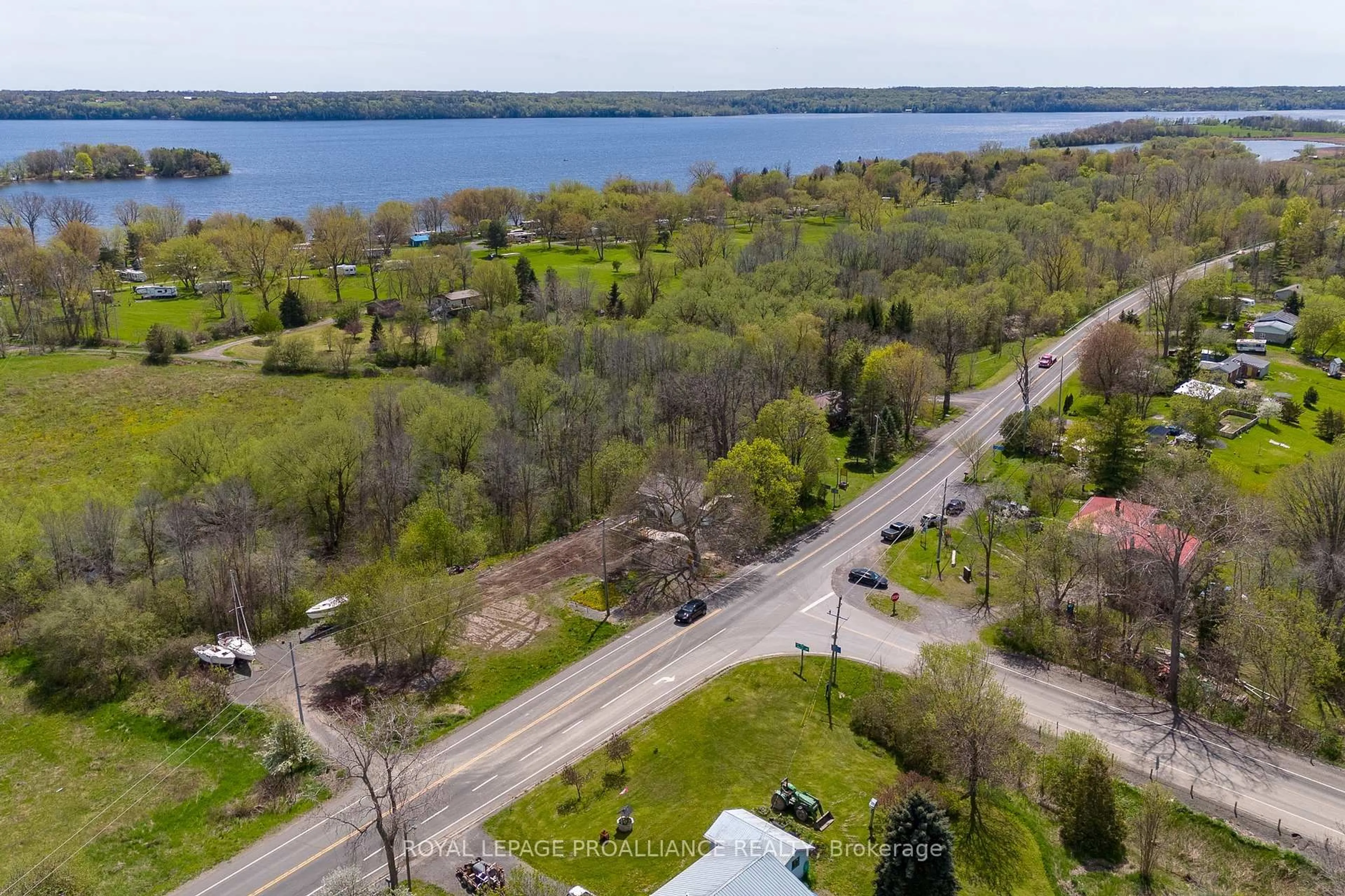 A pic from outside/outdoor area/front of a property/back of a property/a pic from drone, water/lake/river/ocean view for 10346 Loyalist Pkwy, Bath Ontario K0H 1G0