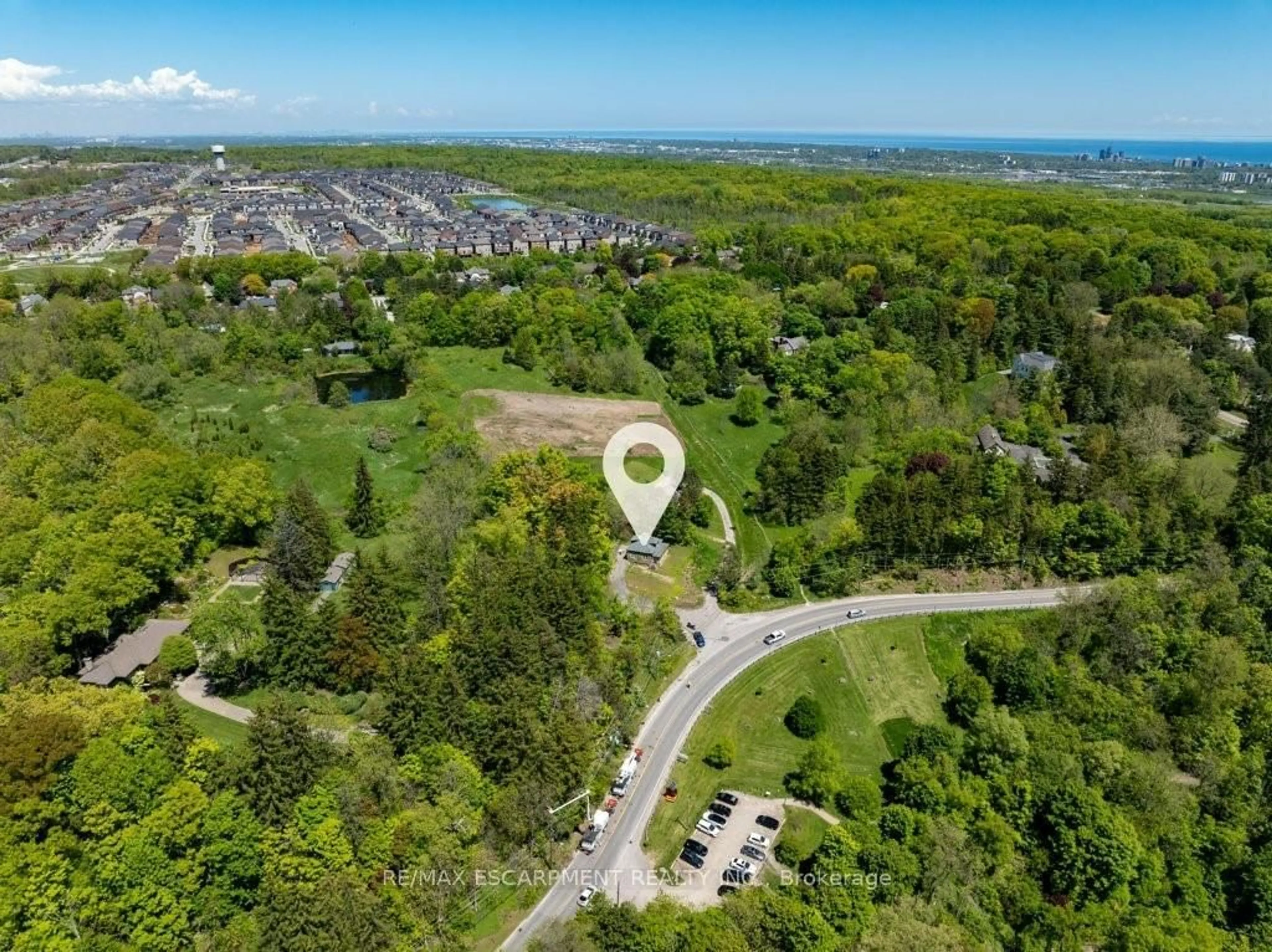 A pic from outside/outdoor area/front of a property/back of a property/a pic from drone, forest/trees view for 191 Mill St, Hamilton Ontario L0R 2H0