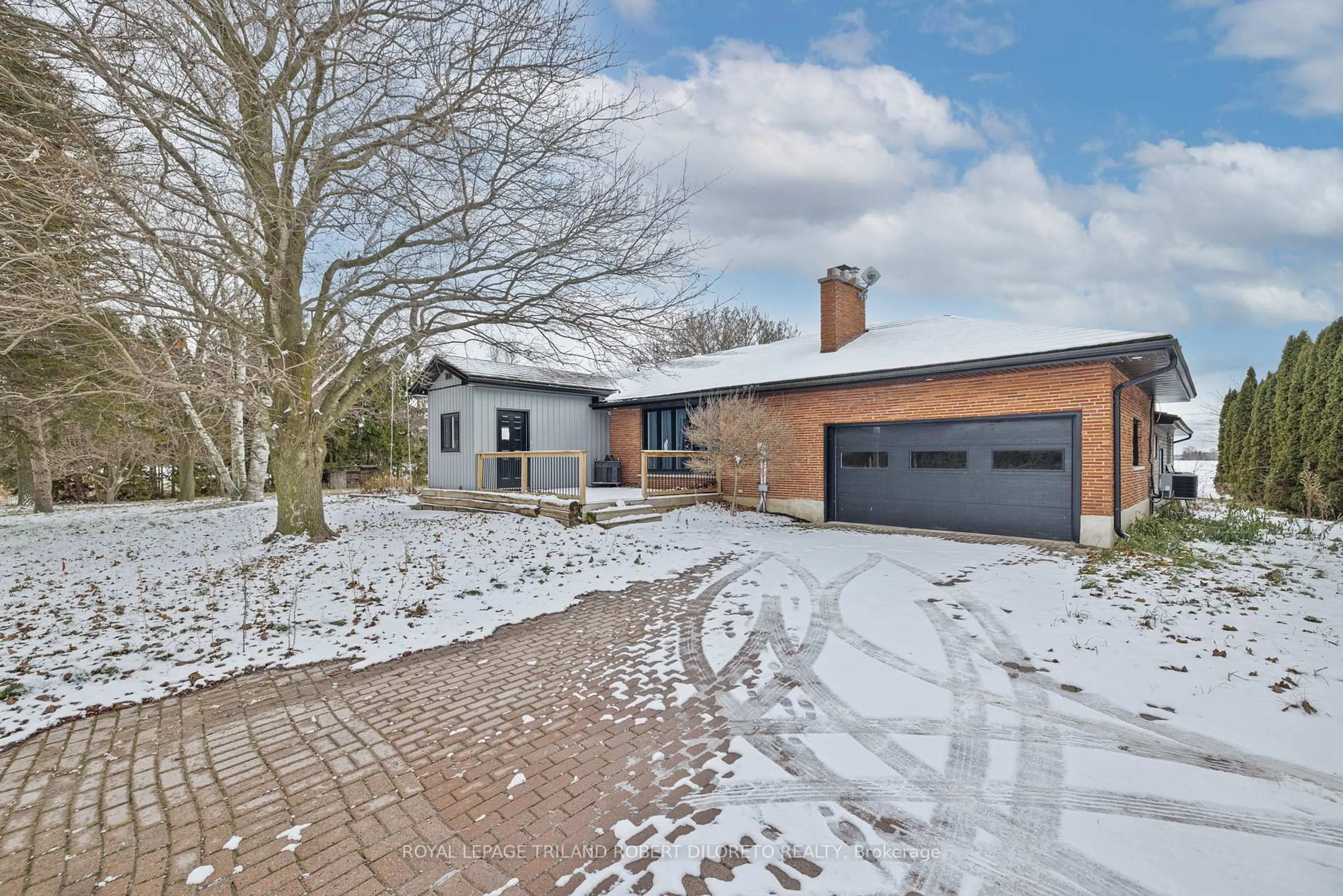 Home with brick exterior material, street for 9755 Longwoods Rd, Middlesex Centre Ontario N6P 1P2