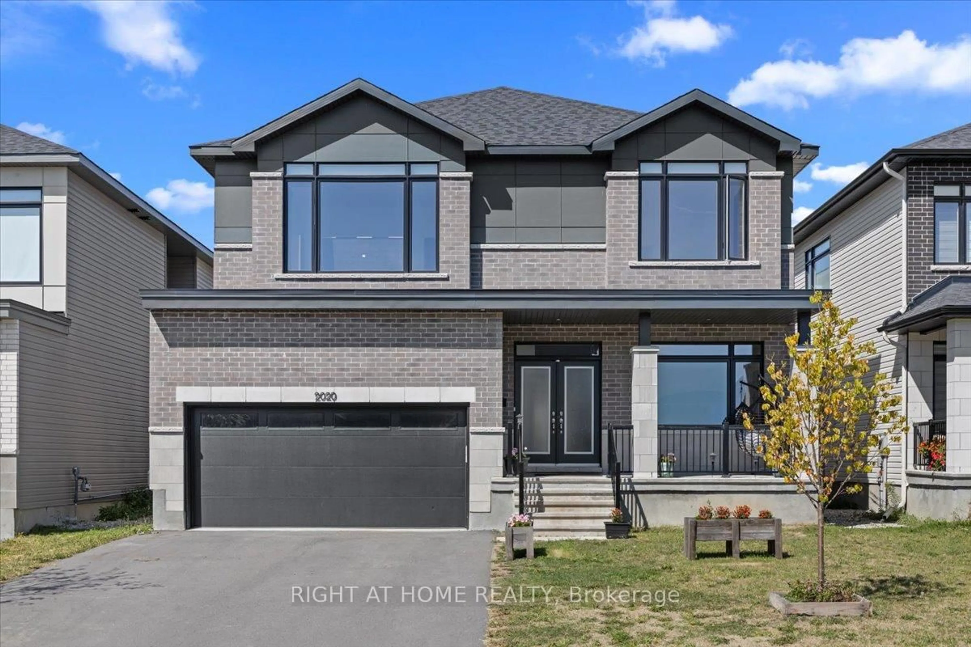 Home with brick exterior material, street for 2020 ACOUSTIC Way, Ottawa Ontario K4M 0L7