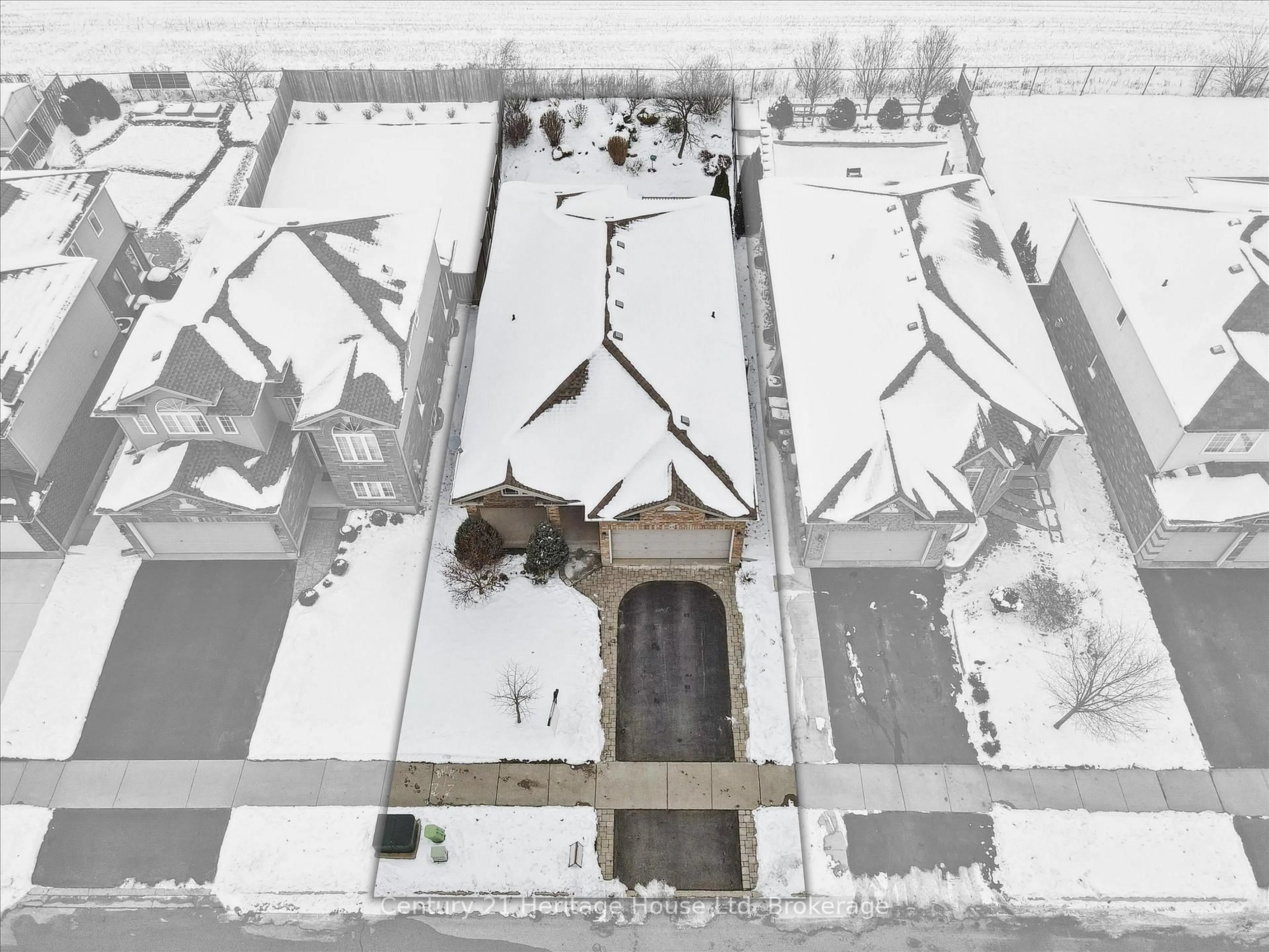 A pic from outside/outdoor area/front of a property/back of a property/a pic from drone, street for 65 Norton Dr, Guelph Ontario N1E 7K8