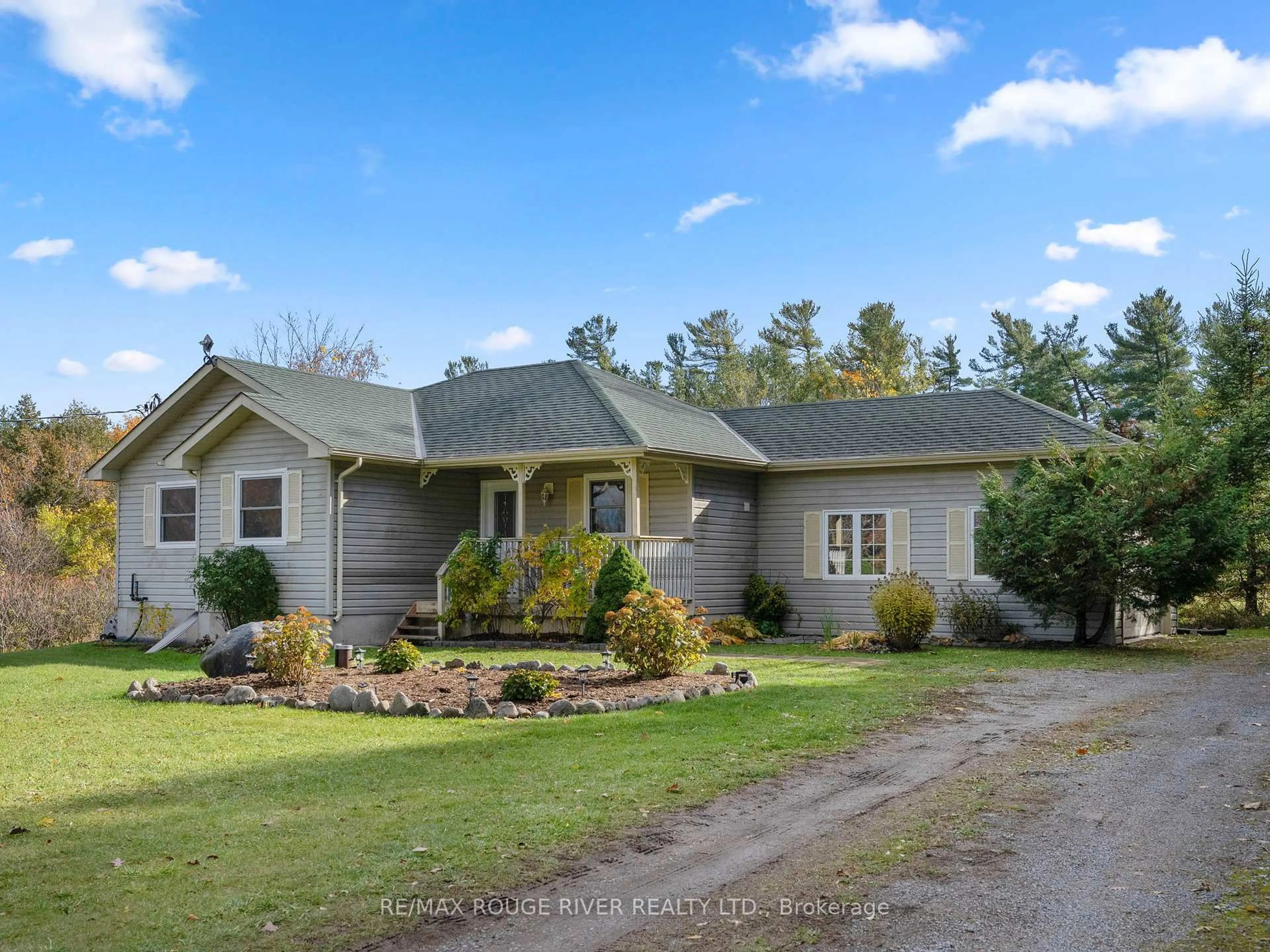 A pic from outside/outdoor area/front of a property/back of a property/a pic from drone, street for 5471 RICE LAKE SCENIC Dr, Hamilton Township Ontario K0K 2E0