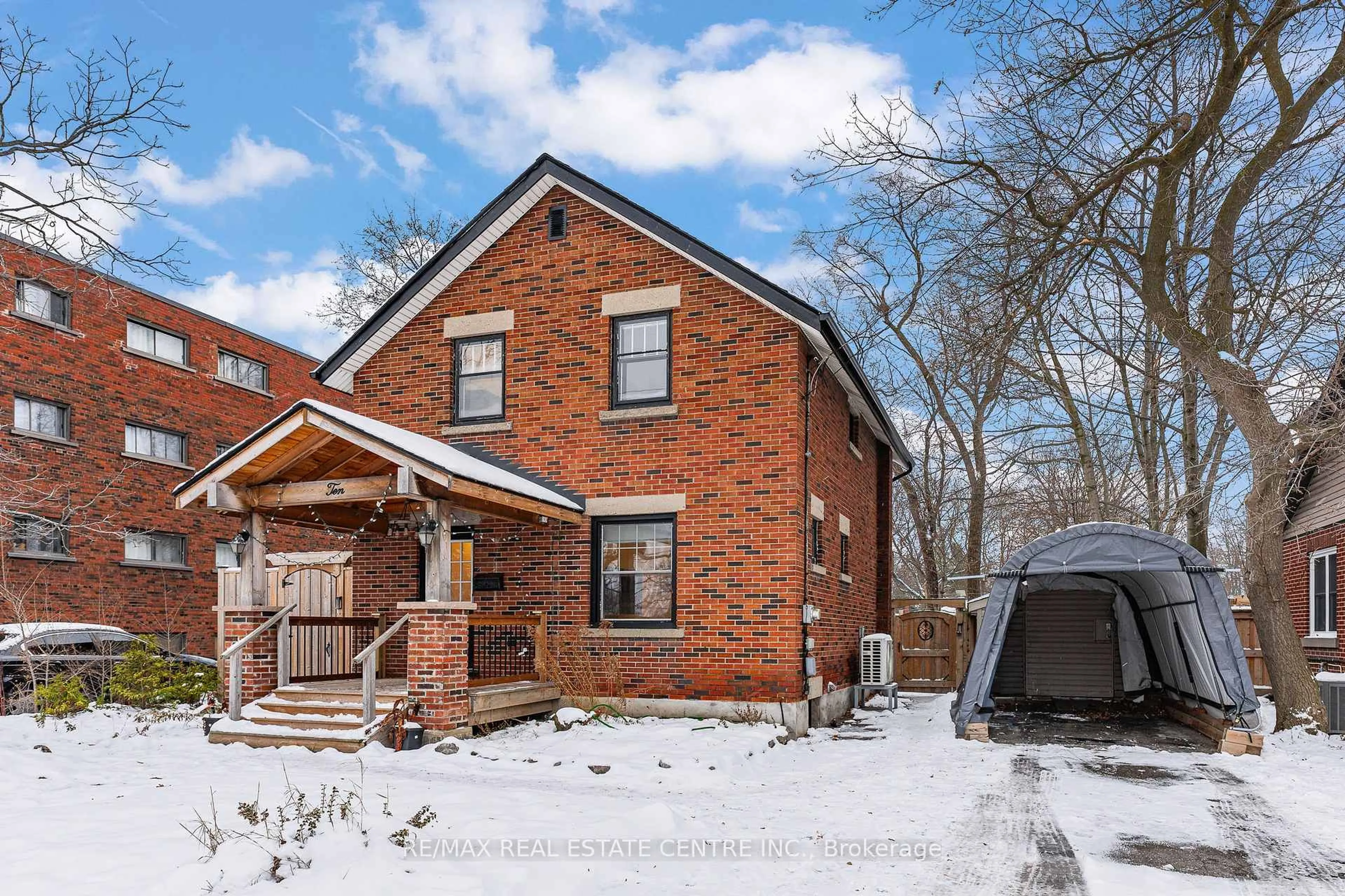 Home with brick exterior material, street for 10 Speedvale Ave, Guelph Ontario N1H 1J4