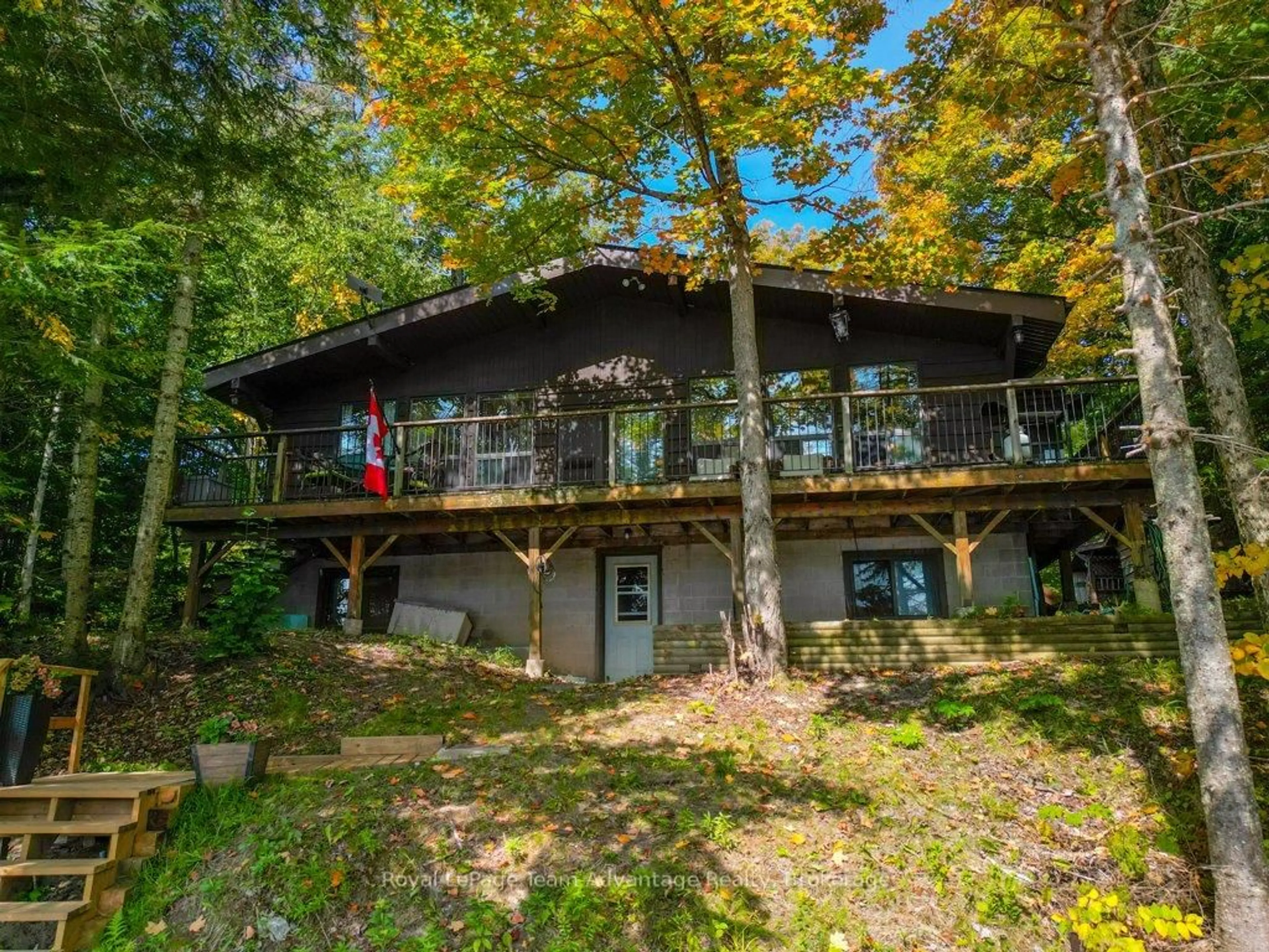 A pic from outside/outdoor area/front of a property/back of a property/a pic from drone, water/lake/river/ocean view for 23 North Star Rd, Seguin Ontario P2A 2W9