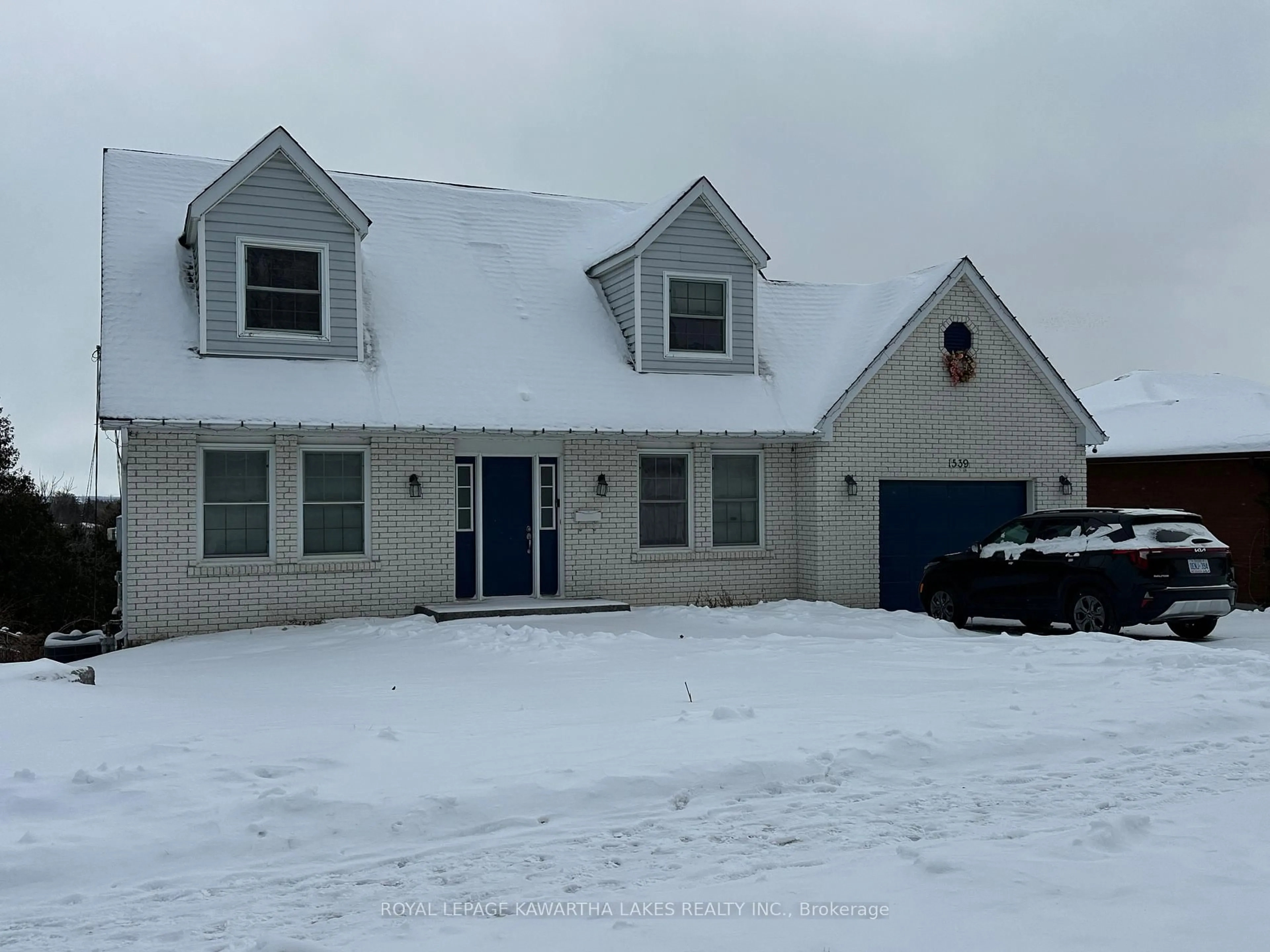 Home with vinyl exterior material, street for 1539 Cherryhill Rd, Peterborough Ontario K9K 1A7