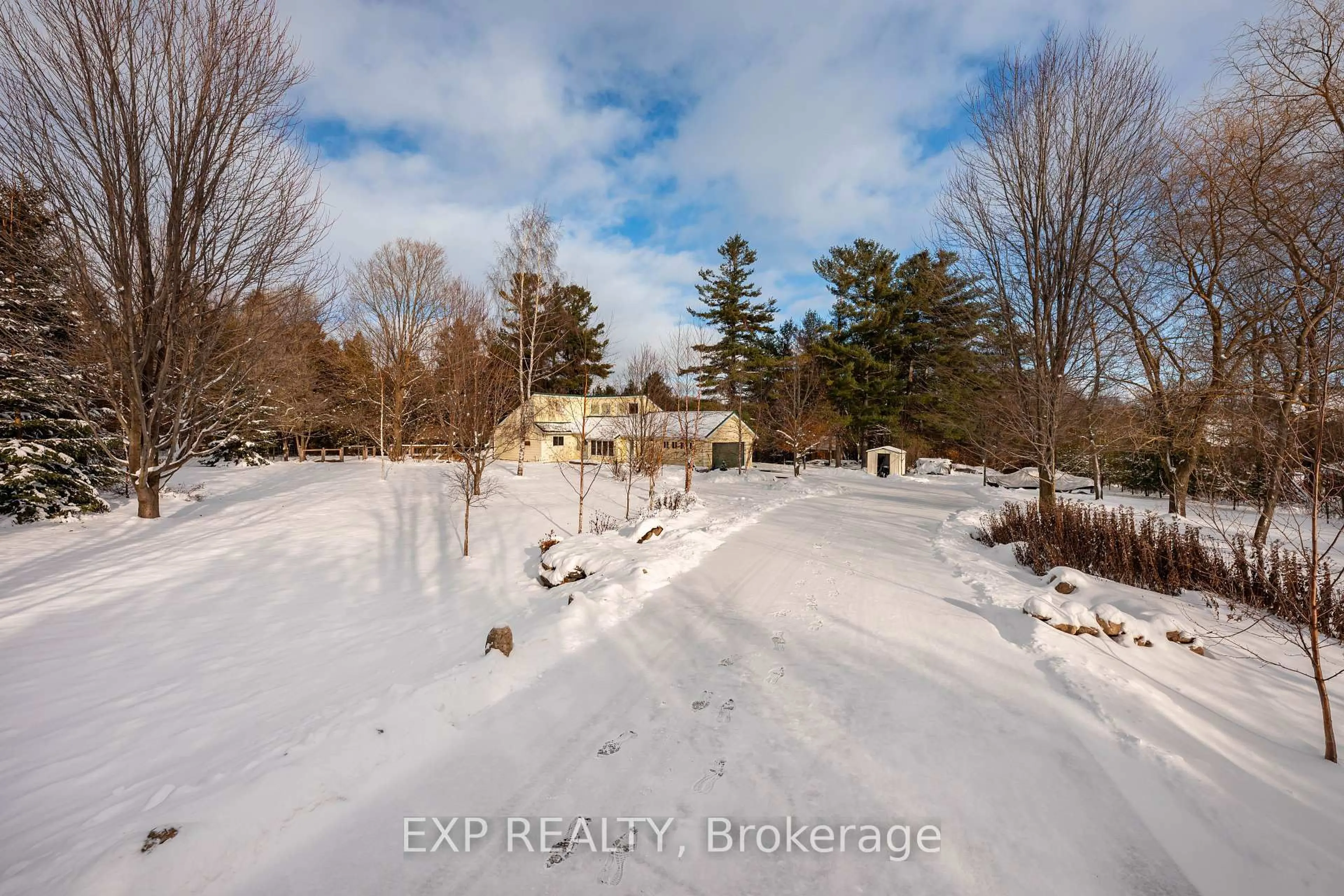 A pic from outside/outdoor area/front of a property/back of a property/a pic from drone, unknown for 213037 10th Line, Amaranth Ontario L9W 0G3