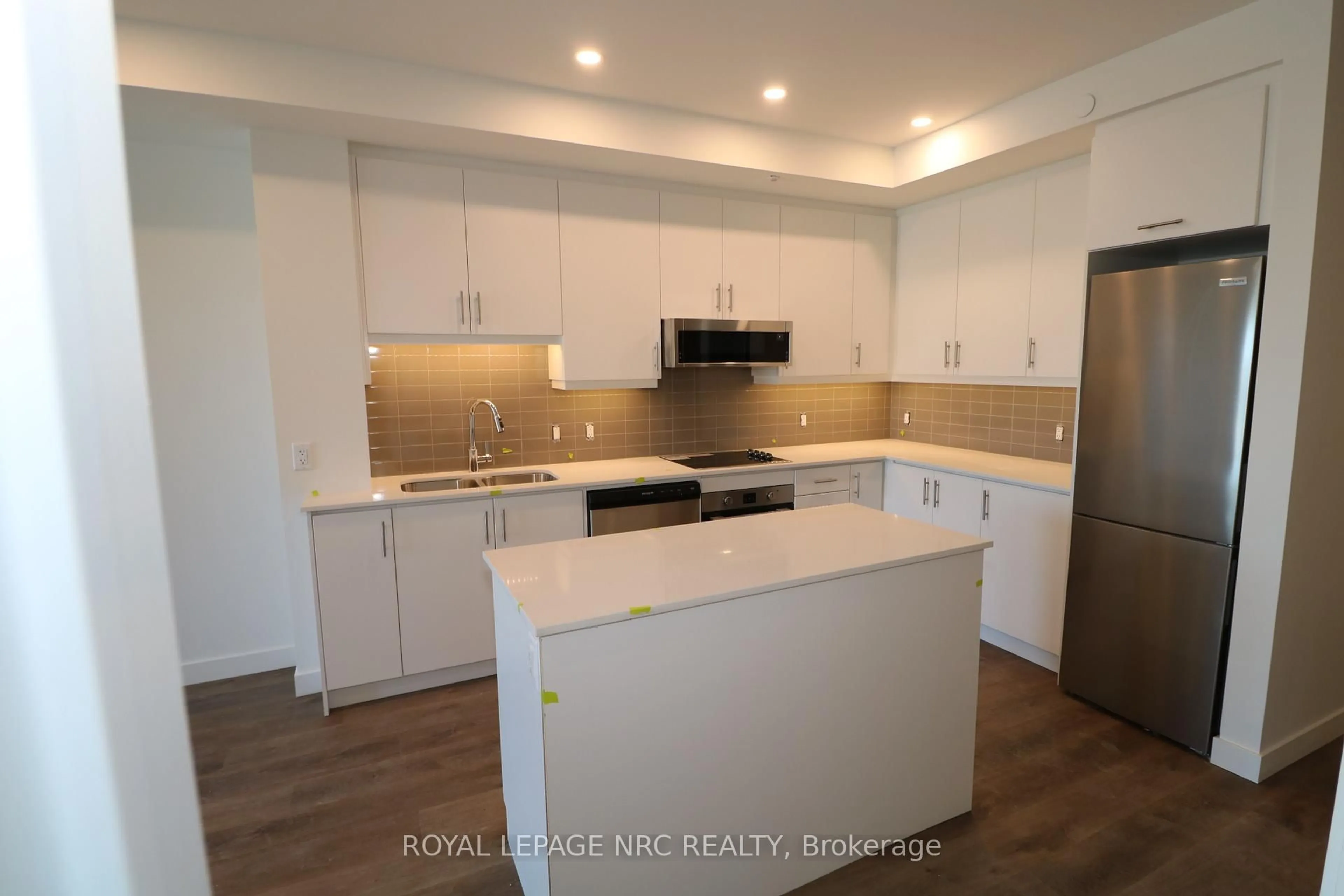 Open concept kitchen, unknown for 461 Green Rd #311, Hamilton Ontario L8E 5B4