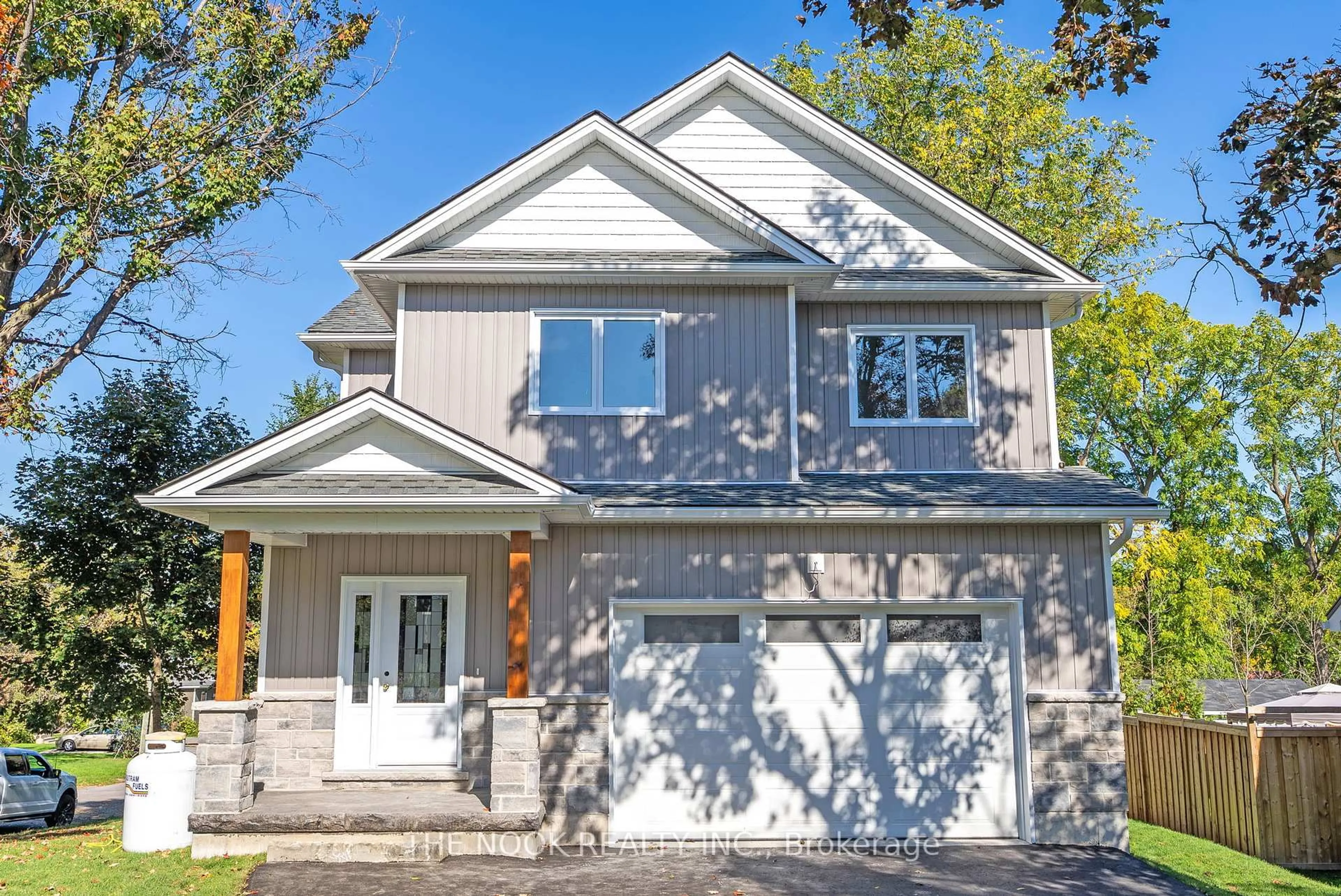 Home with vinyl exterior material, street for 50 Russell St, Kawartha Lakes Ontario K9V 2A6