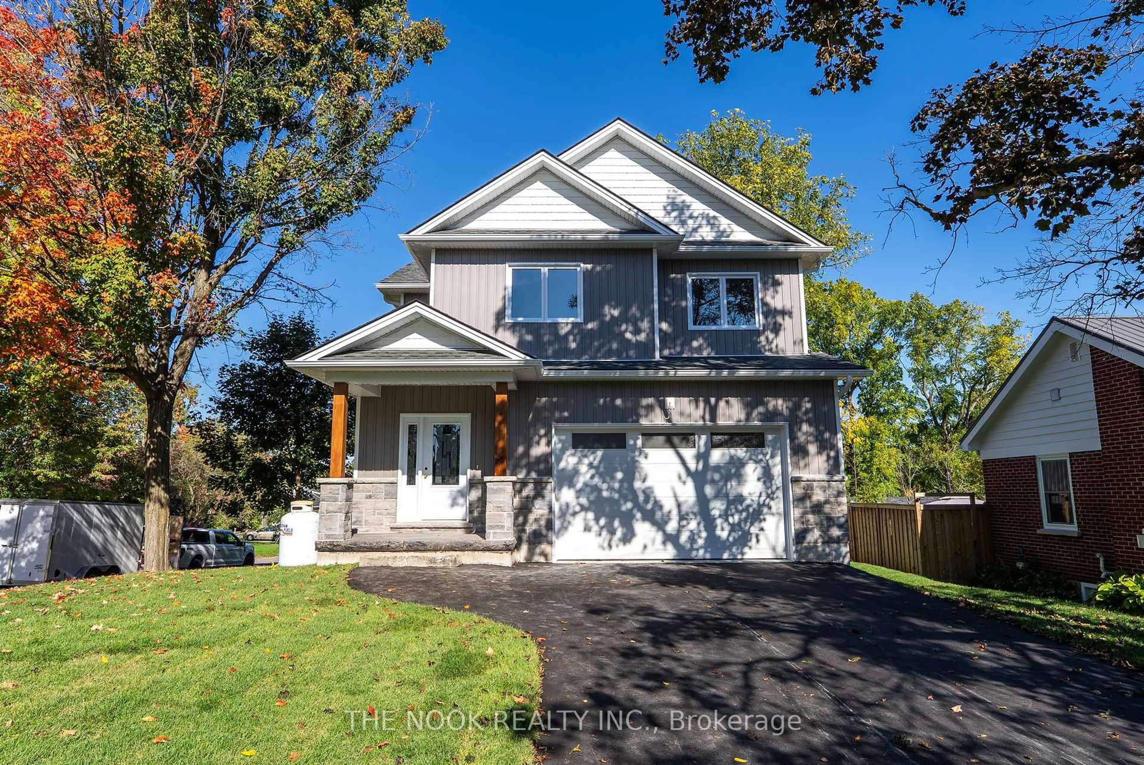 Home with vinyl exterior material, street for 50 Russell St, Kawartha Lakes Ontario K9V 2A6