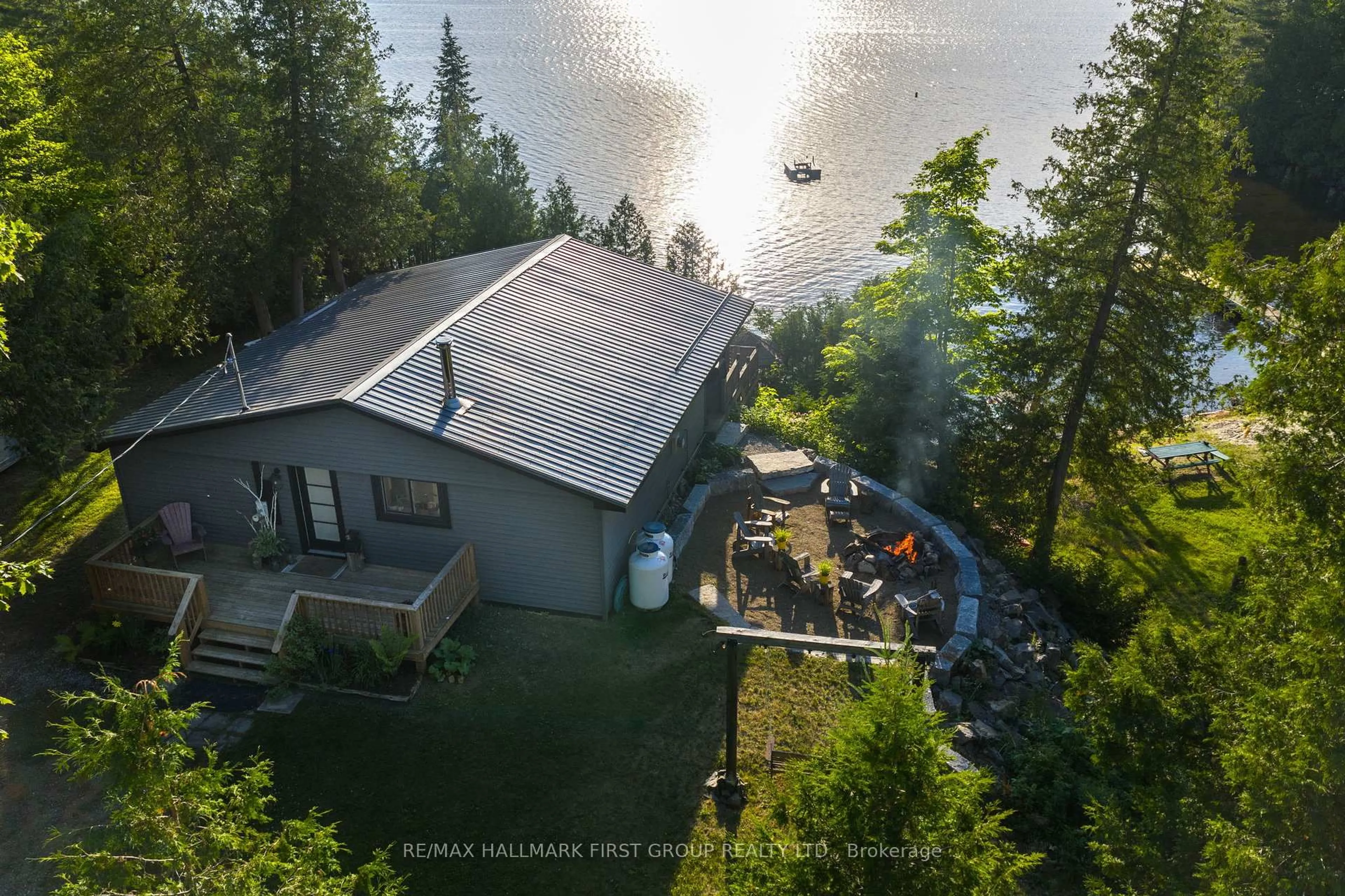 A pic from outside/outdoor area/front of a property/back of a property/a pic from drone, water/lake/river/ocean view for 402 STEENBURG LAKE Rd, Limerick Ontario K0M 1W0