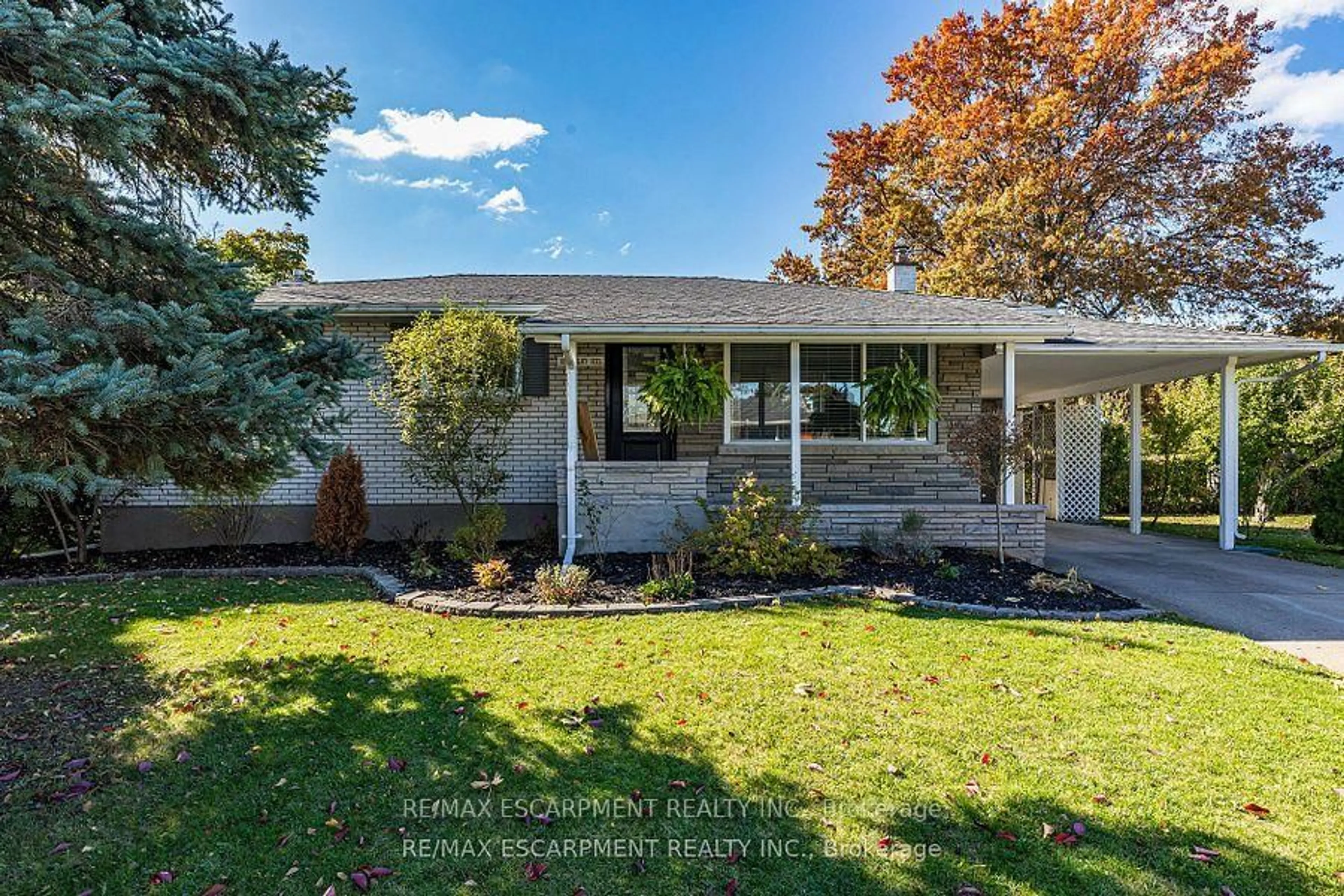 Home with vinyl exterior material, street for 12 Ridley Heights Dr, St. Catharines Ontario L2S 2J2