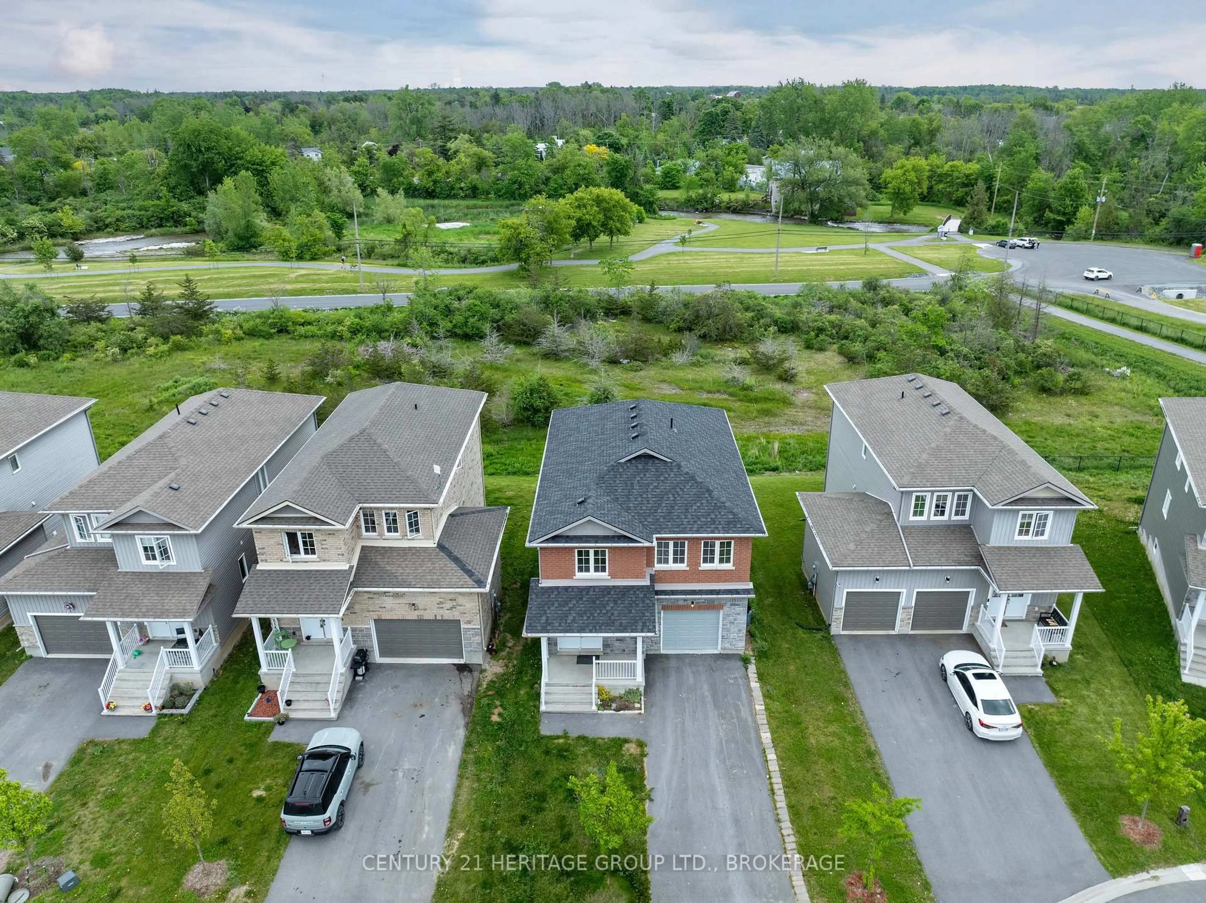 A pic from outside/outdoor area/front of a property/back of a property/a pic from drone, unknown for 104 Brennan Cres, Bissett Creek Ontario K0H 2H0